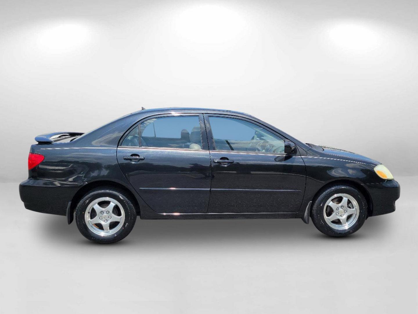 2003 Black /Gray Toyota Corolla LE (JTDBR32E730) with an Gas I4 1.8L/108 engine, 4-Speed Automatic w/OD transmission, located at 1430 Gateway Drive, Opelika, AL, 36801, (334) 239-0944, 32.637871, -85.409790 - 2003 Toyota Corolla LE - Photo#3