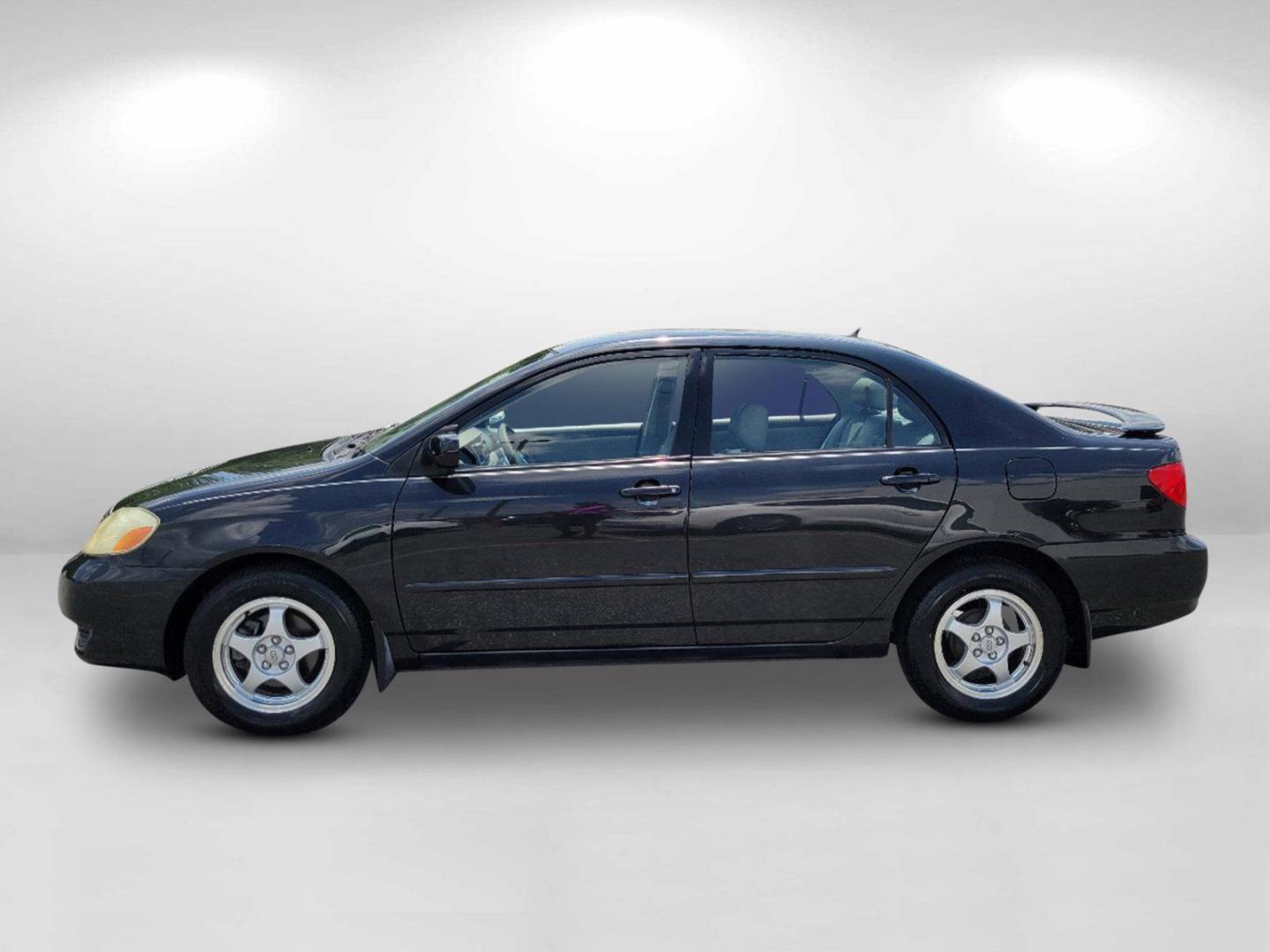 2003 Black /Gray Toyota Corolla LE (JTDBR32E730) with an Gas I4 1.8L/108 engine, 4-Speed Automatic w/OD transmission, located at 1430 Gateway Drive, Opelika, AL, 36801, (334) 239-0944, 32.637871, -85.409790 - 2003 Toyota Corolla LE - Photo#7