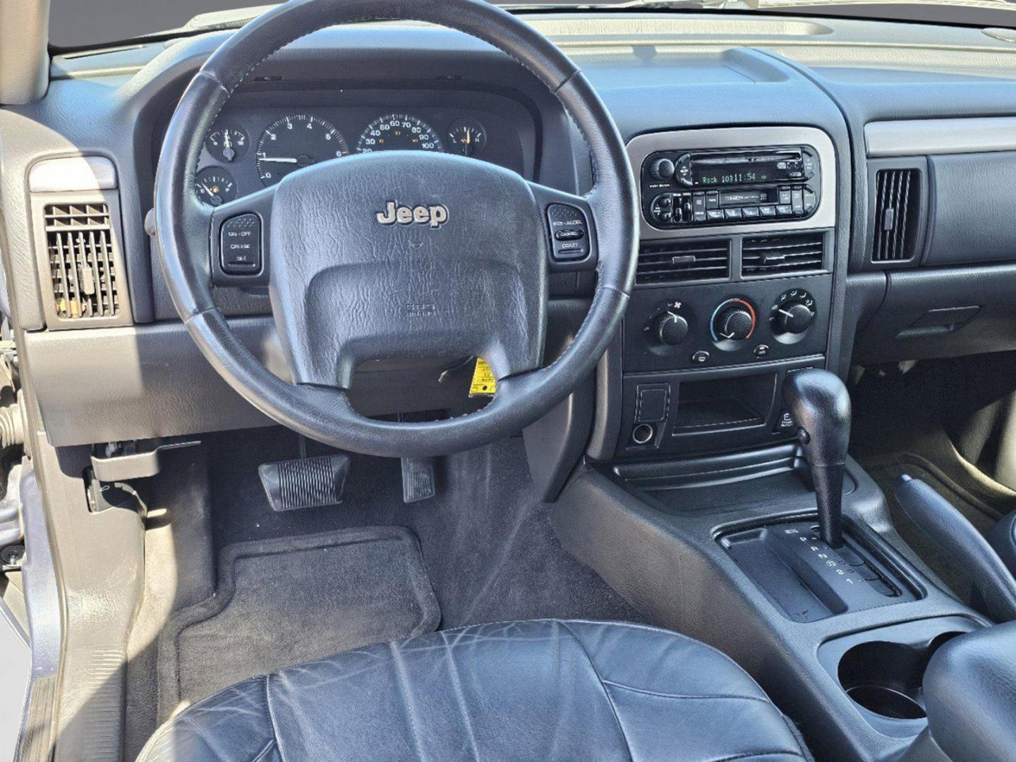 2004 Steel Blue Pearl /Dark Slate Gray Jeep Grand Cherokee Laredo (1J4GX48S34C) with an Gas I6 4.0L/242 engine, 4-Speed Automatic w/OD transmission, located at 804 22nd Ave, Phenix City, AL, 36870, (334) 297-1860, 32.484749, -85.024475 - 2004 Jeep Grand Cherokee Laredo - Photo#12