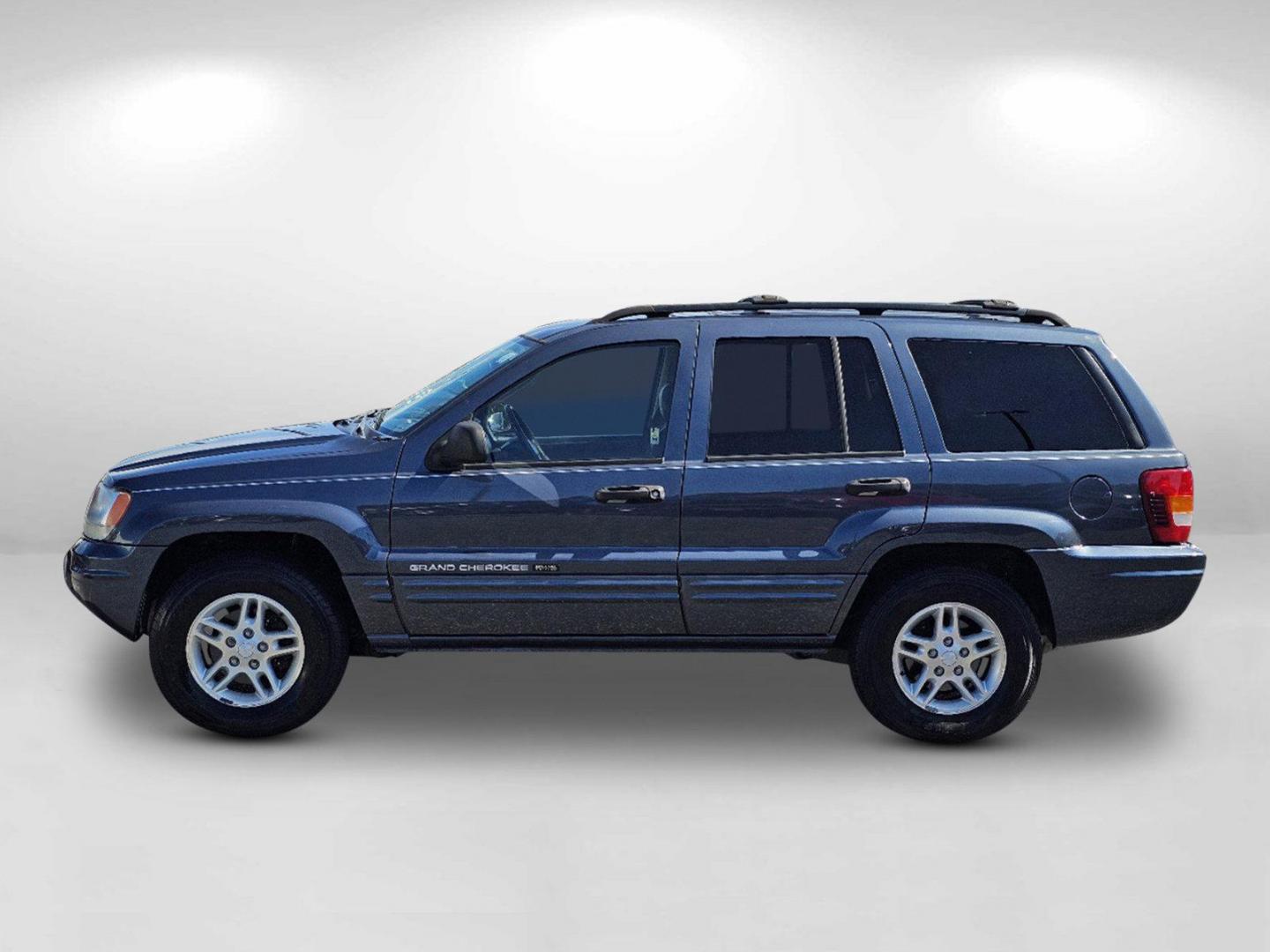 2004 Steel Blue Pearl /Dark Slate Gray Jeep Grand Cherokee Laredo (1J4GX48S34C) with an Gas I6 4.0L/242 engine, 4-Speed Automatic w/OD transmission, located at 804 22nd Ave, Phenix City, AL, 36870, (334) 297-1860, 32.484749, -85.024475 - 2004 Jeep Grand Cherokee Laredo - Photo#7