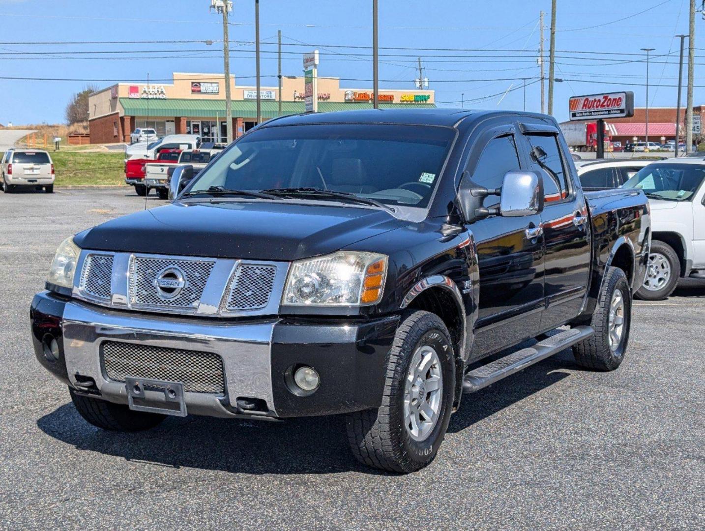 2004 Nissan Titan (1N6AA07B24N) with an Gas V8 5.6L/342 engine, 5-Speed Automatic w/OD transmission, located at 5115 14th Ave., Columbus, GA, 31904, (706) 323-0345, 32.511494, -84.971046 - 2004 Nissan Titan - Photo#0