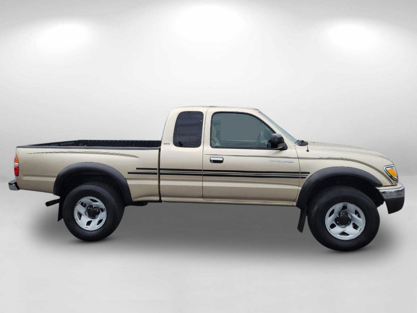 2004 Gold Toyota Tacoma PreRunner (5TESN92N34Z) with an Gas V6 3.4L/208 engine, 4-Speed Automatic w/OD transmission, located at 7000 Northlake Connector, Columbus, GA, 31904, (706) 987-8085, 32.524975, -84.978134 - 2004 Toyota Tacoma PreRunner - Photo#3