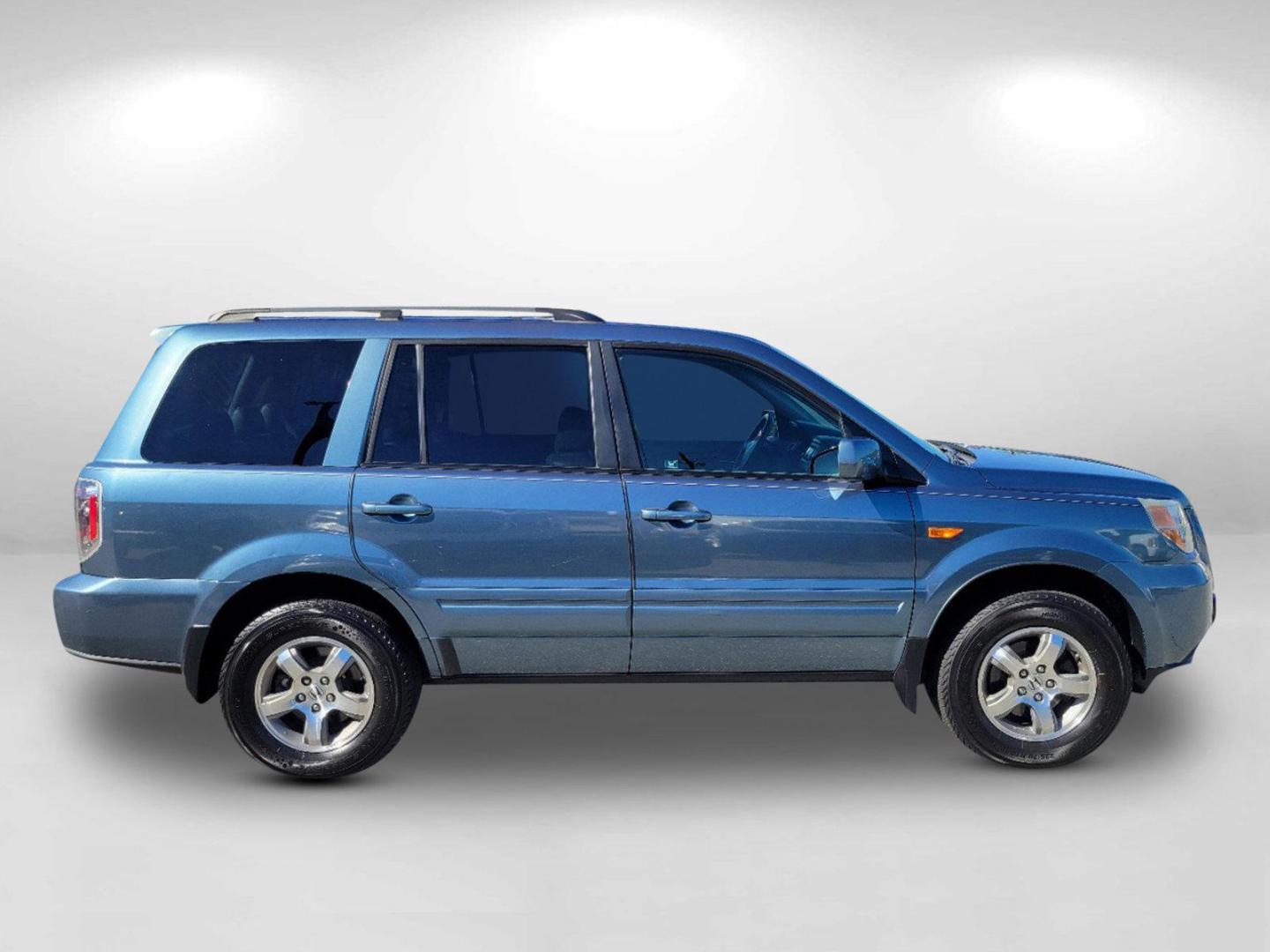 2006 Blue Honda Pilot EX-L (5FNYF28506B) with an Gas V6 3.5L/212 engine, 5-Speed Automatic w/OD transmission, located at 7000 Northlake Connector, Columbus, GA, 31904, (706) 987-8085, 32.524975, -84.978134 - 2006 Honda Pilot EX-L - Photo#3