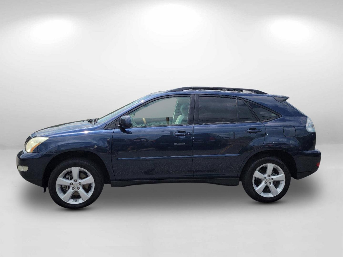 2006 Blue Lexus RX 330 (2T2GA31U66C) with an Gas V6 3.3L/202 engine, 5-Speed Automatic w/OD transmission, located at 1430 Gateway Drive, Opelika, AL, 36801, (334) 239-0944, 32.637871, -85.409790 - 2006 Lexus RX 330 - Photo#7