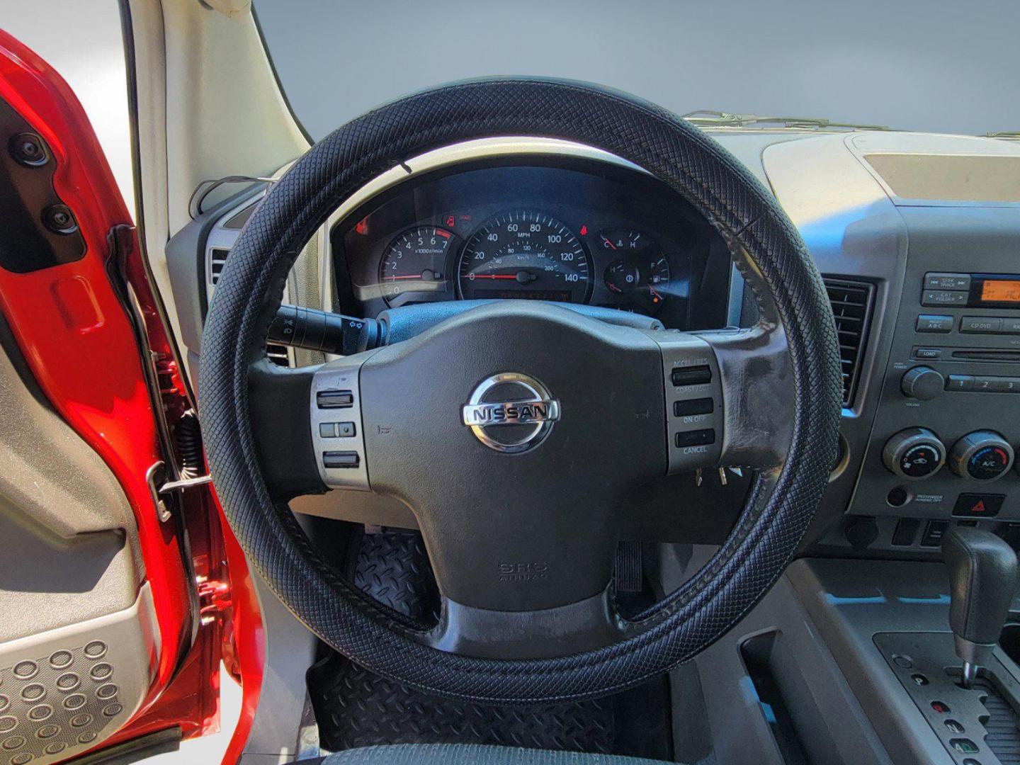 2006 Red Nissan Titan (1N6BA07BX6N) with an Gas/Ethanol V8 5.6L/339 engine, 5-Speed Automatic w/OD transmission, located at 7000 Northlake Connector, Columbus, GA, 31904, (706) 987-8085, 32.524975, -84.978134 - 2006 Nissan Titan - Photo#12