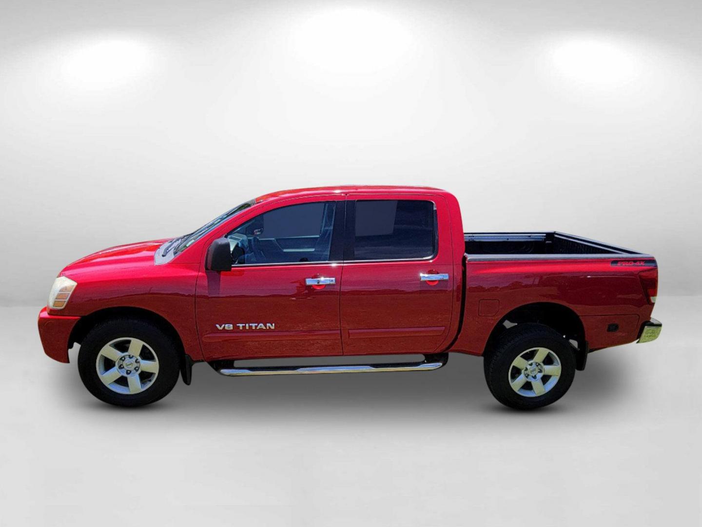 2006 Red Nissan Titan (1N6BA07BX6N) with an Gas/Ethanol V8 5.6L/339 engine, 5-Speed Automatic w/OD transmission, located at 7000 Northlake Connector, Columbus, GA, 31904, (706) 987-8085, 32.524975, -84.978134 - 2006 Nissan Titan - Photo#7