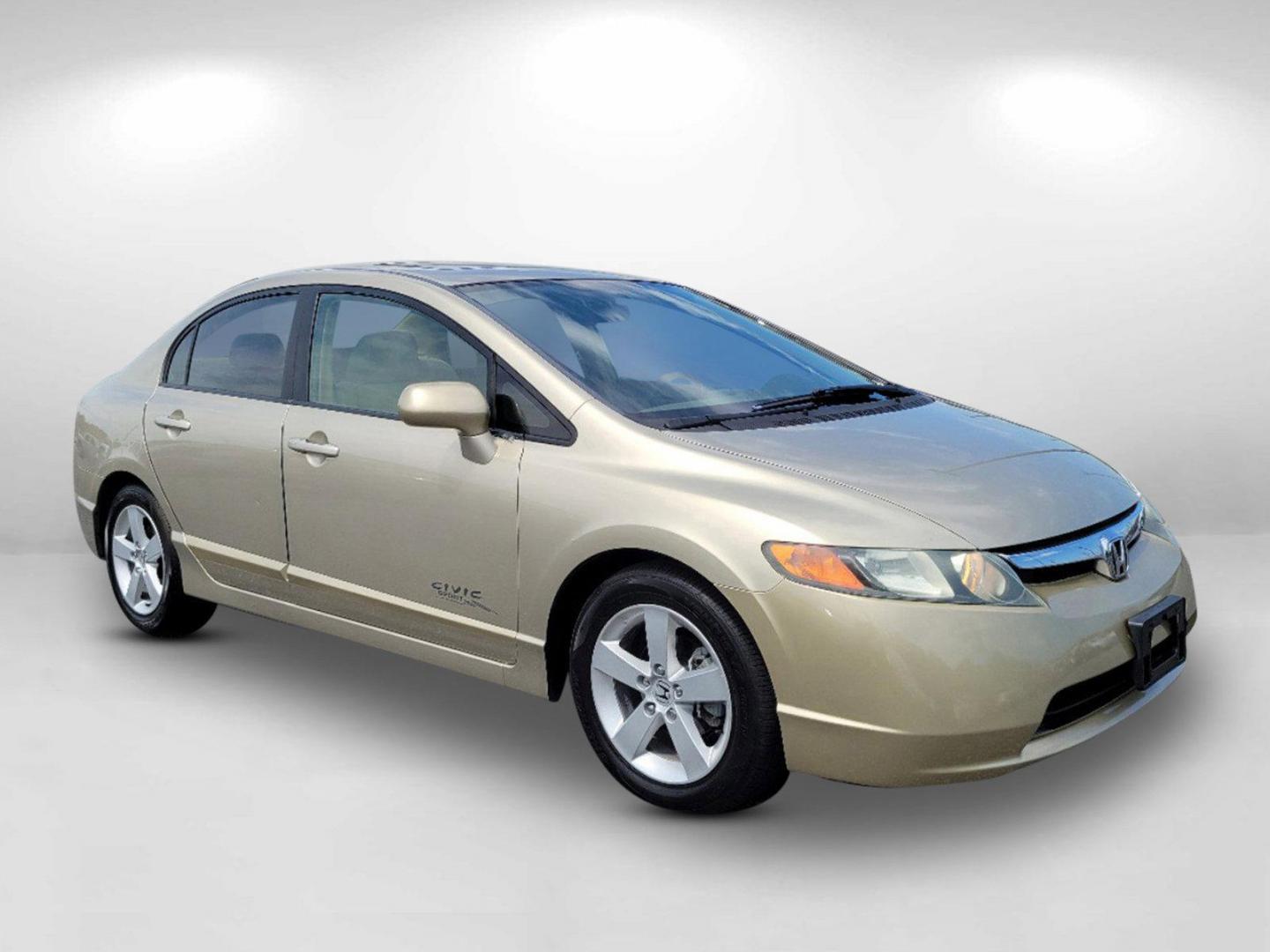 2007 Gold Honda Civic Sdn EX (1HGFA16877L) with an Gas I4 1.8L/110 engine, 5-Speed Automatic transmission, located at 3959 U.S. 80 W, Phenix City, AL, 36870, (334) 297-4885, 32.469296, -85.135185 - 2007 Honda Civic Sdn EX - Photo#2