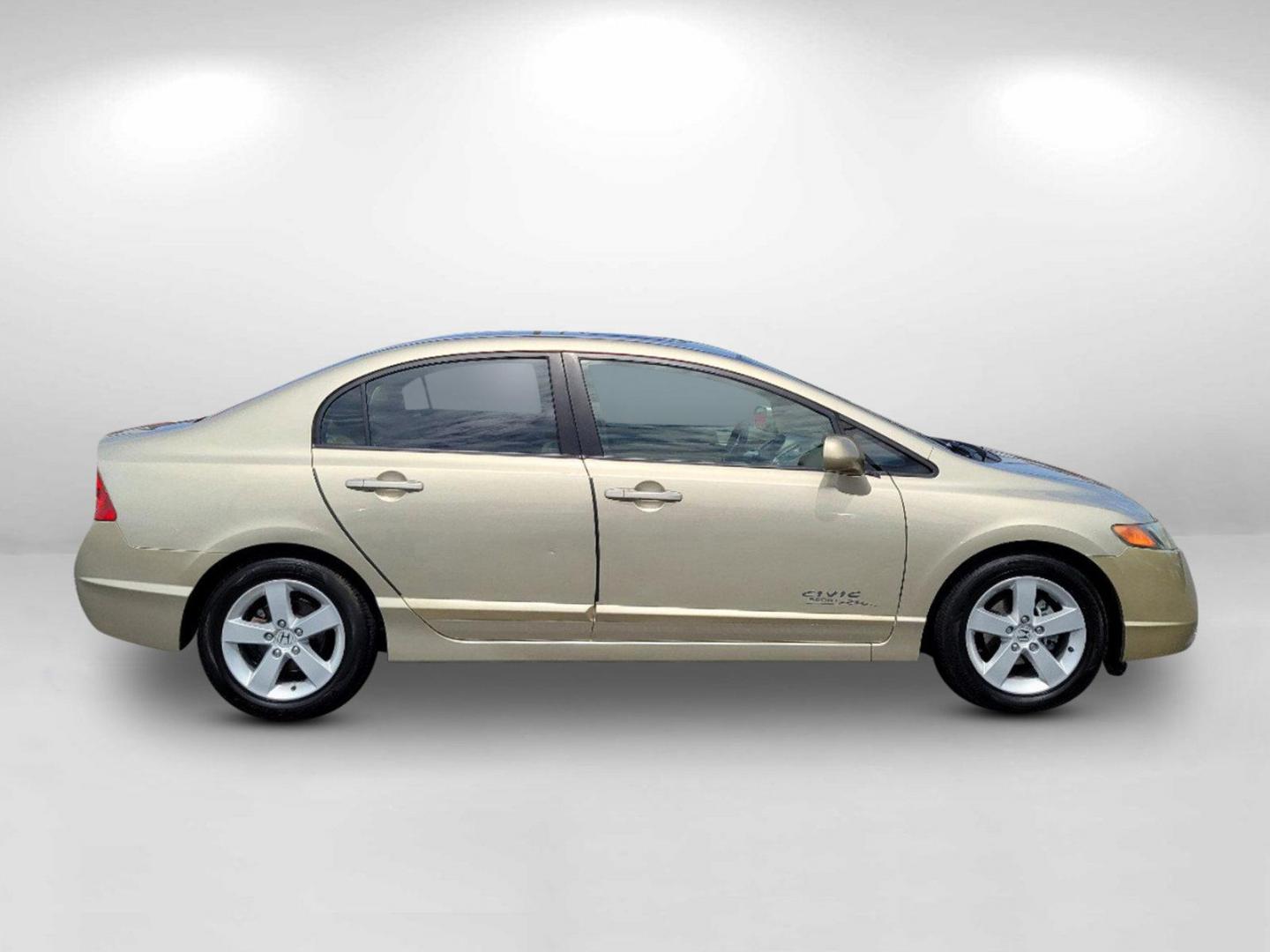 2007 Gold Honda Civic Sdn EX (1HGFA16877L) with an Gas I4 1.8L/110 engine, 5-Speed Automatic transmission, located at 3959 U.S. 80 W, Phenix City, AL, 36870, (334) 297-4885, 32.469296, -85.135185 - 2007 Honda Civic Sdn EX - Photo#3