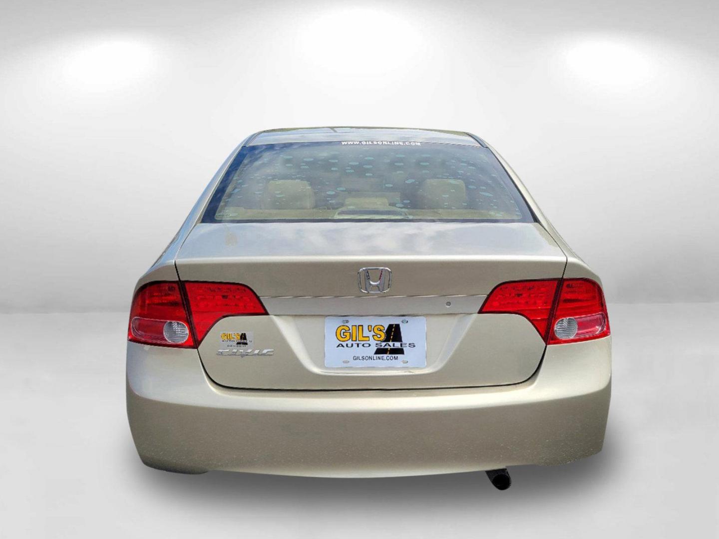 2007 Gold Honda Civic Sdn EX (1HGFA16877L) with an Gas I4 1.8L/110 engine, 5-Speed Automatic transmission, located at 3959 U.S. 80 W, Phenix City, AL, 36870, (334) 297-4885, 32.469296, -85.135185 - 2007 Honda Civic Sdn EX - Photo#5