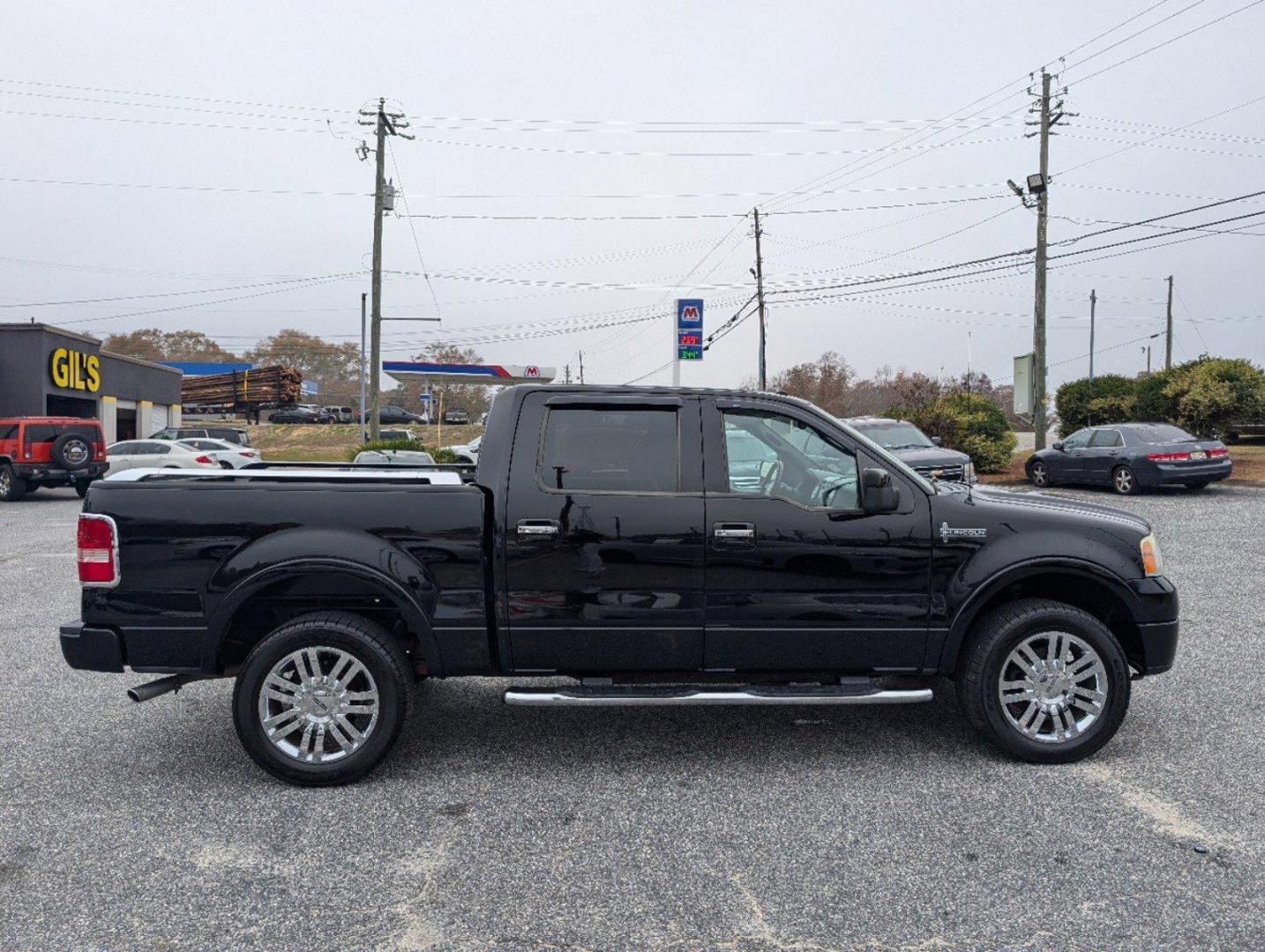 2007 Lincoln Mark LT (5LTPW18547F) with an Gas V8 5.4L/330 engine, 4-Speed Automatic w/OD transmission, located at 804 22nd Ave, Phenix City, AL, 36870, (334) 297-1860, 32.484749, -85.024475 - 2007 Lincoln Mark LT - Photo#4