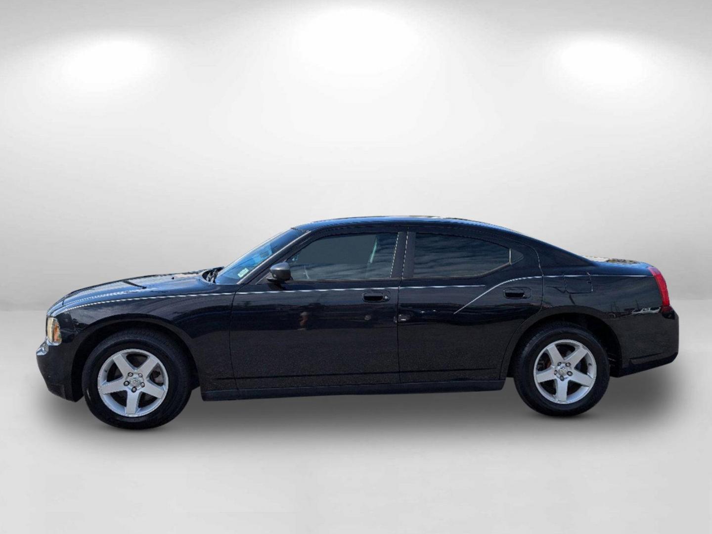 2009 /Dark Slate Gray Dodge Charger SE (2B3KA43D59H) with an Gas V6 2.7L/167 engine, 4-Speed Automatic transmission, located at 804 22nd Ave, Phenix City, AL, 36870, (334) 297-1860, 32.484749, -85.024475 - 2009 Dodge Charger SE - Photo#7