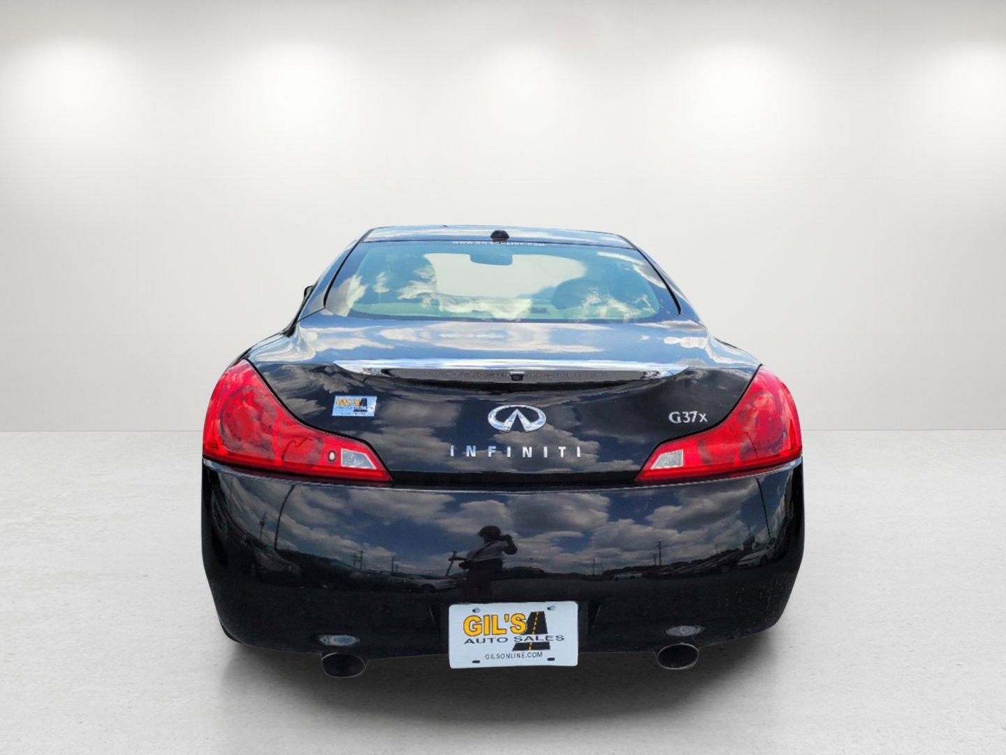 2009 Black Obsidian /Wheat Infiniti G37 Coupe x (JNKCV64F19M) with an Gas V6 3.7L/225 engine, 7-Speed Automatic w/OD transmission, located at 7000 Northlake Connector, Columbus, GA, 31904, (706) 987-8085, 32.524975, -84.978134 - 2009 Infiniti G37 Coupe x - Photo#5