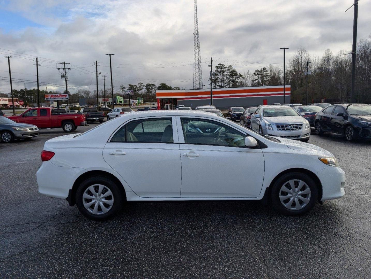 2009 Toyota Corolla LE (1NXBU40E09Z) with an Gas I4 1.8L/110 engine, 4-Speed Automatic w/OD transmission, located at 521 Old Farm Lane Rd, Prattville, AL, 36066, (334) 325-1505, 32.482460, -86.416367 - 2009 Toyota Corolla LE - Photo#3