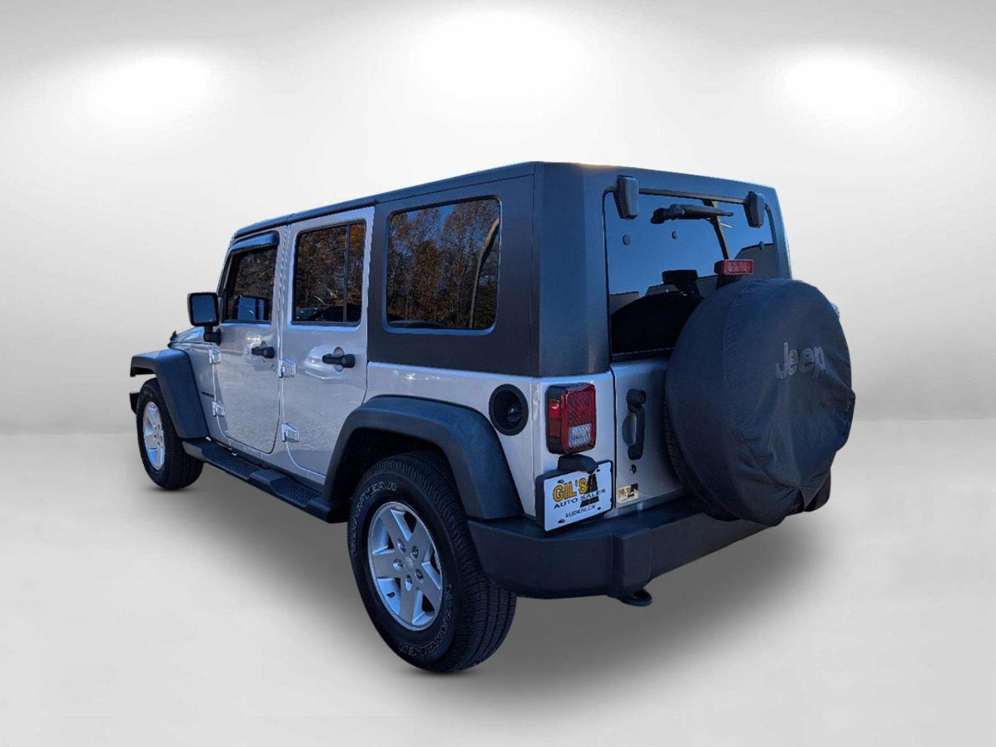 2010 /Dark Slate Gray/Medium Slate Gray Jeep Wrangler Unlimited Sport (1J4BB3H13AL) with an Gas V6 3.8L/231 engine, 4-Speed Automatic transmission, located at 3959 U.S. 80 W, Phenix City, AL, 36870, (334) 297-4885, 32.469296, -85.135185 - 2010 Jeep Wrangler Unlimited Sport - Photo#9