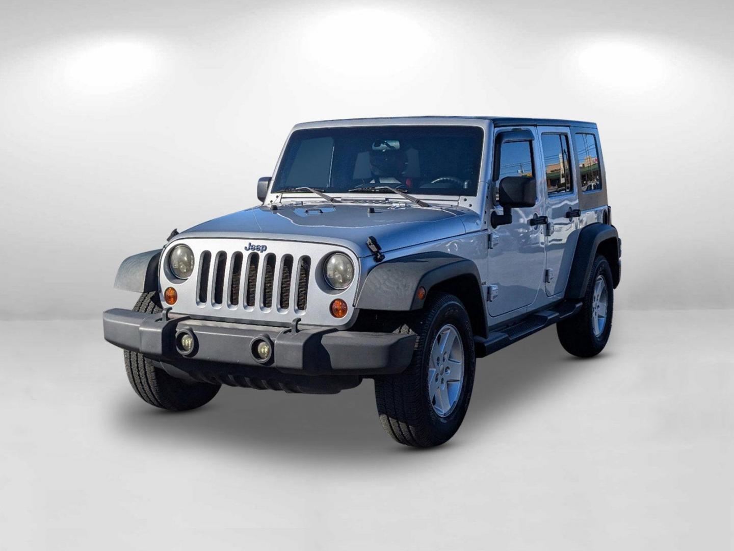 2010 /Dark Slate Gray/Medium Slate Gray Jeep Wrangler Unlimited Sport (1J4BB3H13AL) with an Gas V6 3.8L/231 engine, 4-Speed Automatic transmission, located at 3959 U.S. 80 W, Phenix City, AL, 36870, (334) 297-4885, 32.469296, -85.135185 - 2010 Jeep Wrangler Unlimited Sport - Photo#3