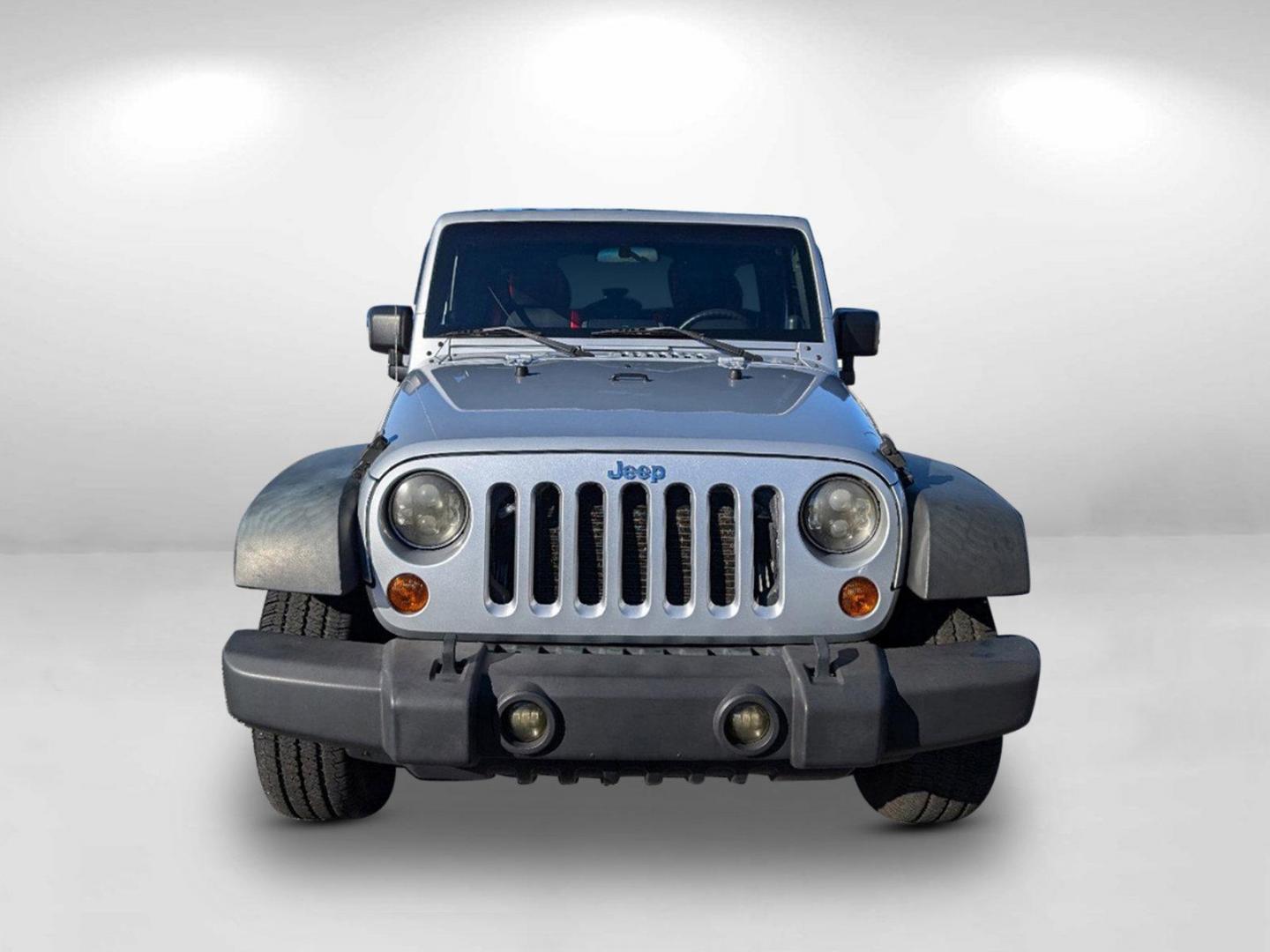 2010 /Dark Slate Gray/Medium Slate Gray Jeep Wrangler Unlimited Sport (1J4BB3H13AL) with an Gas V6 3.8L/231 engine, 4-Speed Automatic transmission, located at 3959 U.S. 80 W, Phenix City, AL, 36870, (334) 297-4885, 32.469296, -85.135185 - 2010 Jeep Wrangler Unlimited Sport - Photo#4