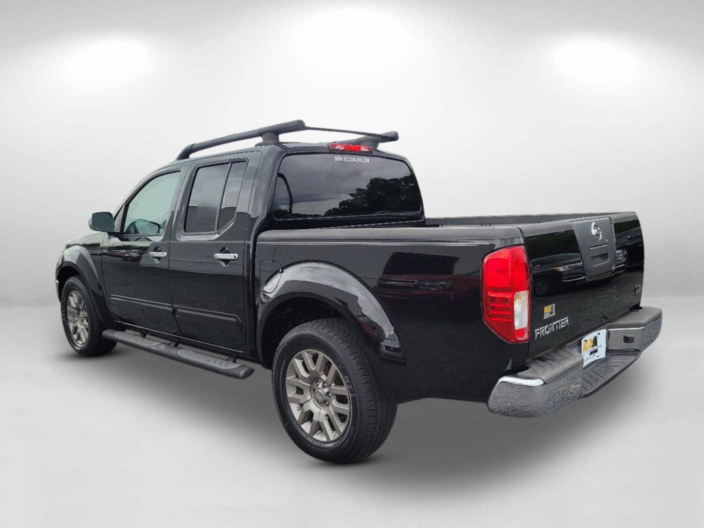 2010 Super Black /Graphite Nissan Frontier LE (1N6AD0ER7AC) with an Gas V6 4.0L/ engine, 5-Speed Automatic w/OD transmission, located at 7000 Northlake Connector, Columbus, GA, 31904, (706) 987-8085, 32.524975, -84.978134 - 2010 Nissan Frontier LE - Photo#6