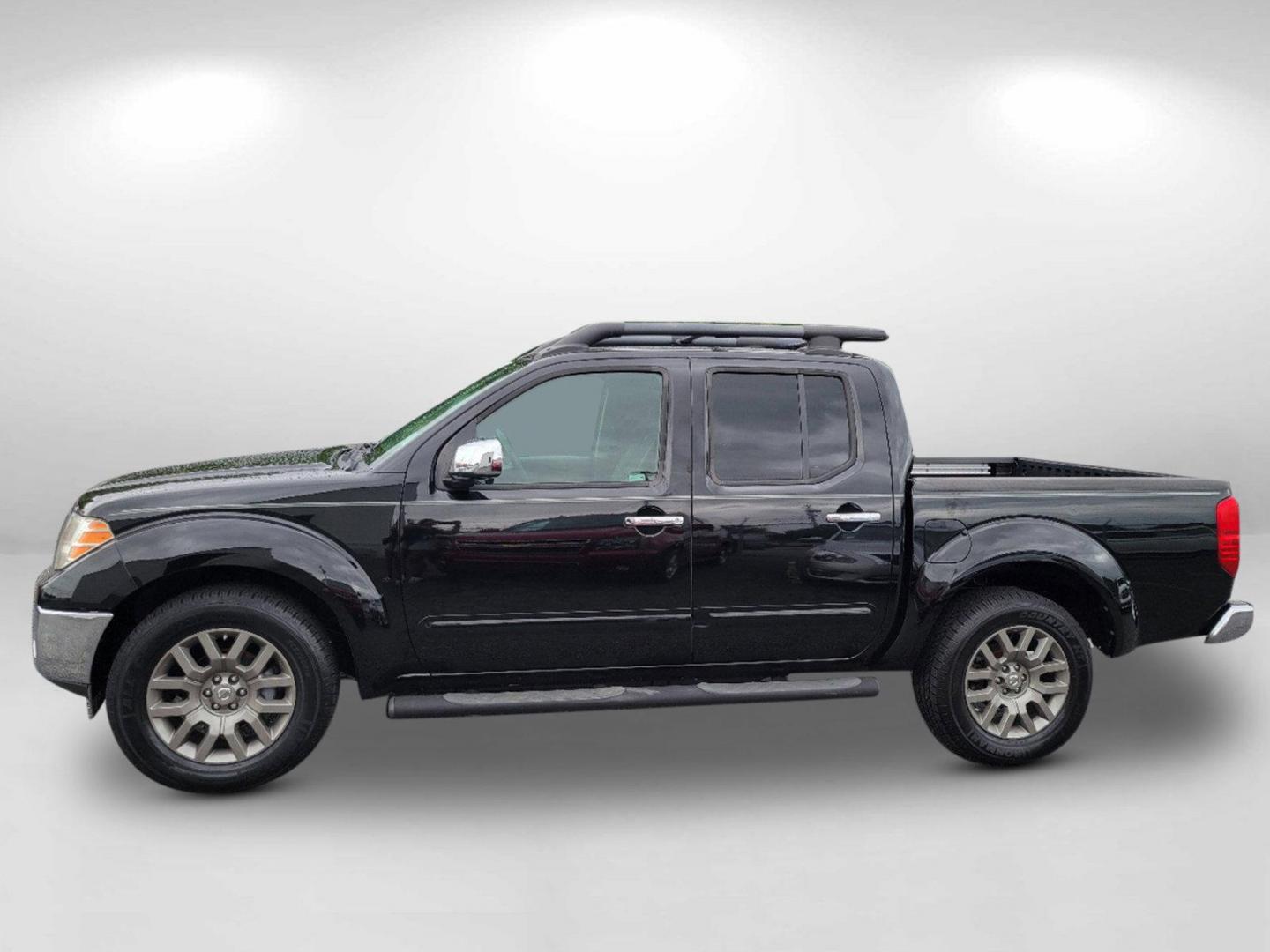 2010 Super Black /Graphite Nissan Frontier LE (1N6AD0ER7AC) with an Gas V6 4.0L/ engine, 5-Speed Automatic w/OD transmission, located at 7000 Northlake Connector, Columbus, GA, 31904, (706) 987-8085, 32.524975, -84.978134 - 2010 Nissan Frontier LE - Photo#7