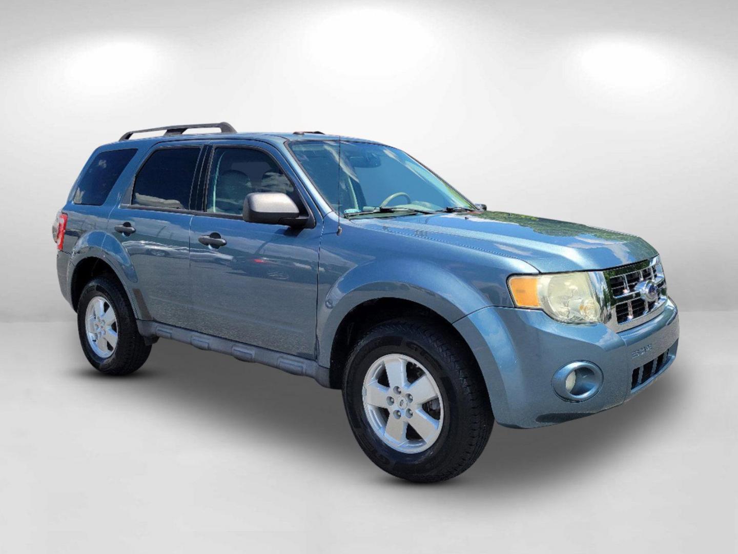 2011 Blue Ford Escape XLT (1FMCU0D73BK) with an Gas I4 2.5L/152 engine, 6-Speed Automatic transmission, located at 5115 14th Ave., Columbus, GA, 31904, (706) 323-0345, 32.511494, -84.971046 - 2011 Ford Escape XLT - Photo#2