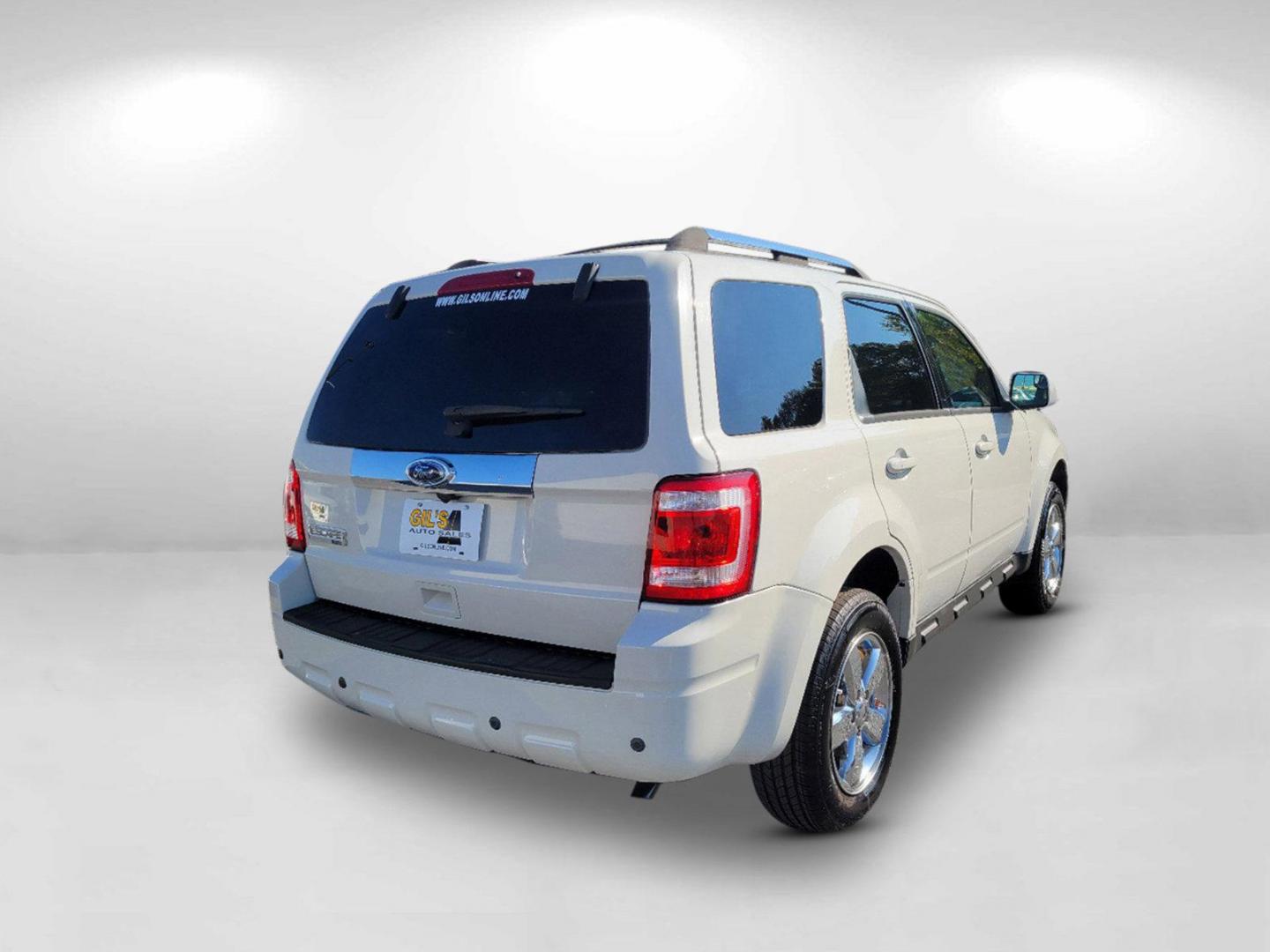 2011 White Ford Escape Limited (1FMCU0E74BK) with an Gas I4 2.5L/152 engine, 6-Speed Automatic transmission, located at 1430 Gateway Drive, Opelika, AL, 36801, (334) 239-0944, 32.637871, -85.409790 - 2011 Ford Escape Limited - Photo#4