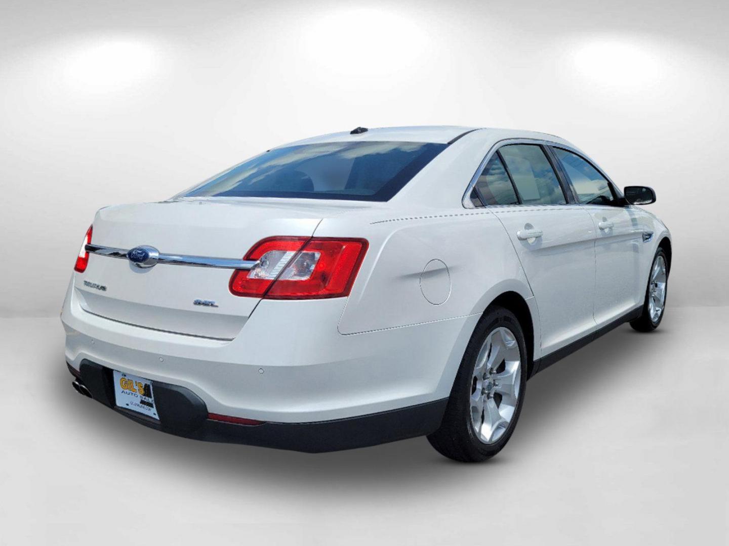 2011 White Ford Taurus SEL (1FAHP2EW2BG) with an Gas V6 3.5L/213 engine, 6-Speed Automatic w/OD SelectShift transmission, located at 3959 U.S. 80 W, Phenix City, AL, 36870, (334) 297-4885, 32.469296, -85.135185 - 2011 Ford Taurus SEL - Photo#4