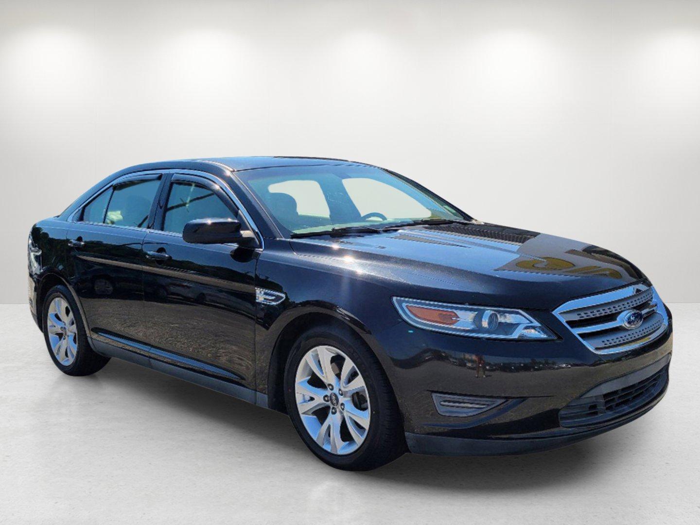 2011 Black Ford Taurus SEL (1FAHP2EW0BG) with an Gas V6 3.5L/213 engine, 6-Speed Automatic w/OD SelectShift transmission, located at 804 22nd Ave, Phenix City, AL, 36870, (334) 297-1860, 32.484749, -85.024475 - 2011 Ford Taurus SEL - Photo#2