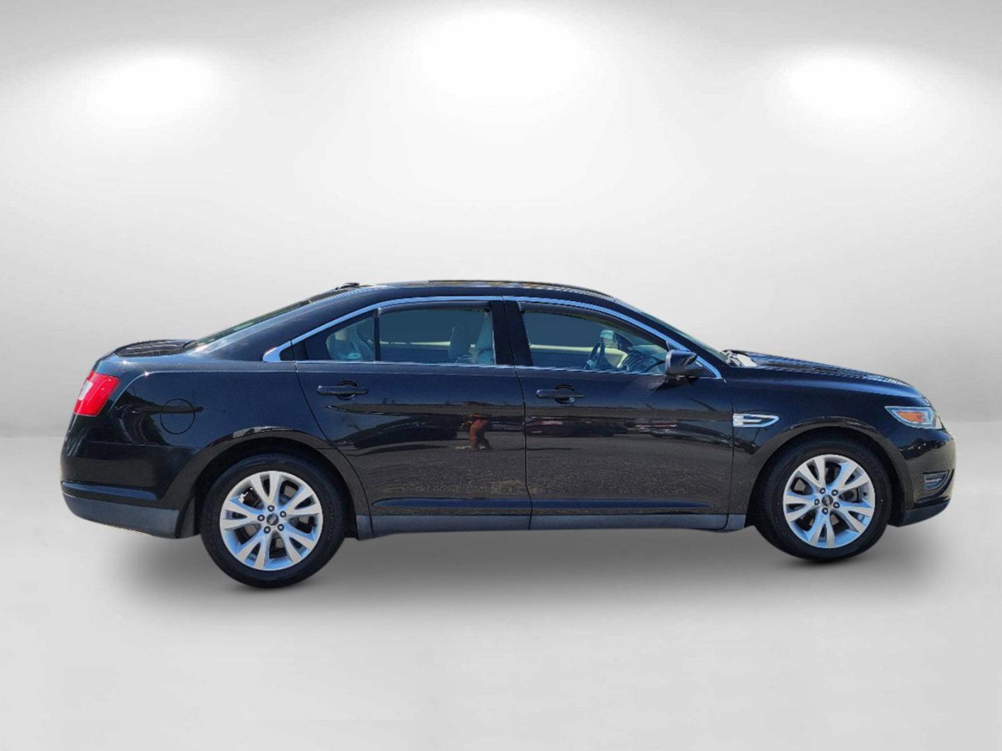 2011 Black Ford Taurus SEL (1FAHP2EW0BG) with an Gas V6 3.5L/213 engine, 6-Speed Automatic w/OD SelectShift transmission, located at 804 22nd Ave, Phenix City, AL, 36870, (334) 297-1860, 32.484749, -85.024475 - 2011 Ford Taurus SEL - Photo#3