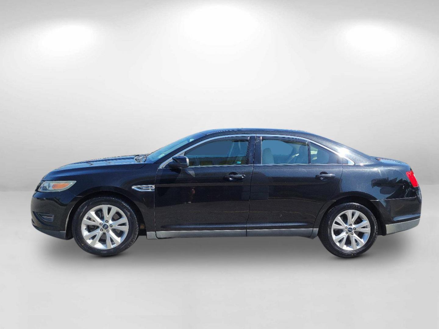 2011 Black Ford Taurus SEL (1FAHP2EW0BG) with an Gas V6 3.5L/213 engine, 6-Speed Automatic w/OD SelectShift transmission, located at 804 22nd Ave, Phenix City, AL, 36870, (334) 297-1860, 32.484749, -85.024475 - 2011 Ford Taurus SEL - Photo#7