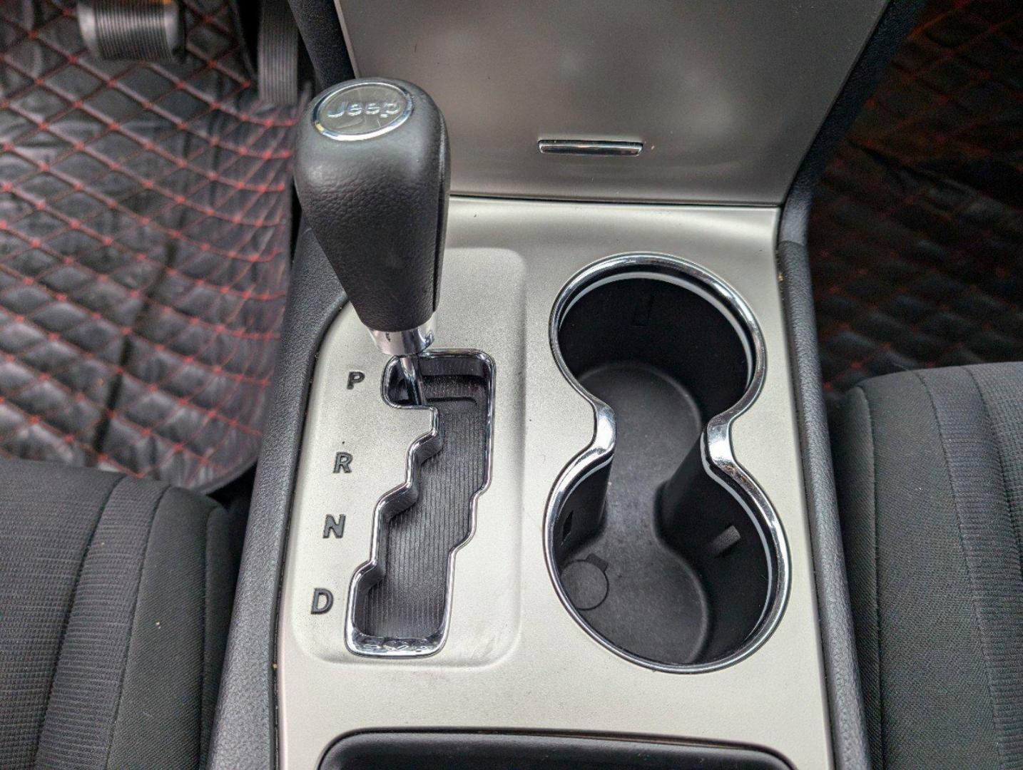 2011 /Black Interior Jeep Grand Cherokee Laredo (1J4RS4GGXBC) with an Gas/Ethanol V6 3.6L/220 engine, 5-Speed Automatic transmission, located at 7000 Northlake Connector, Columbus, GA, 31904, (706) 987-8085, 32.524975, -84.978134 - 2011 Jeep Grand Cherokee Laredo - Photo#14