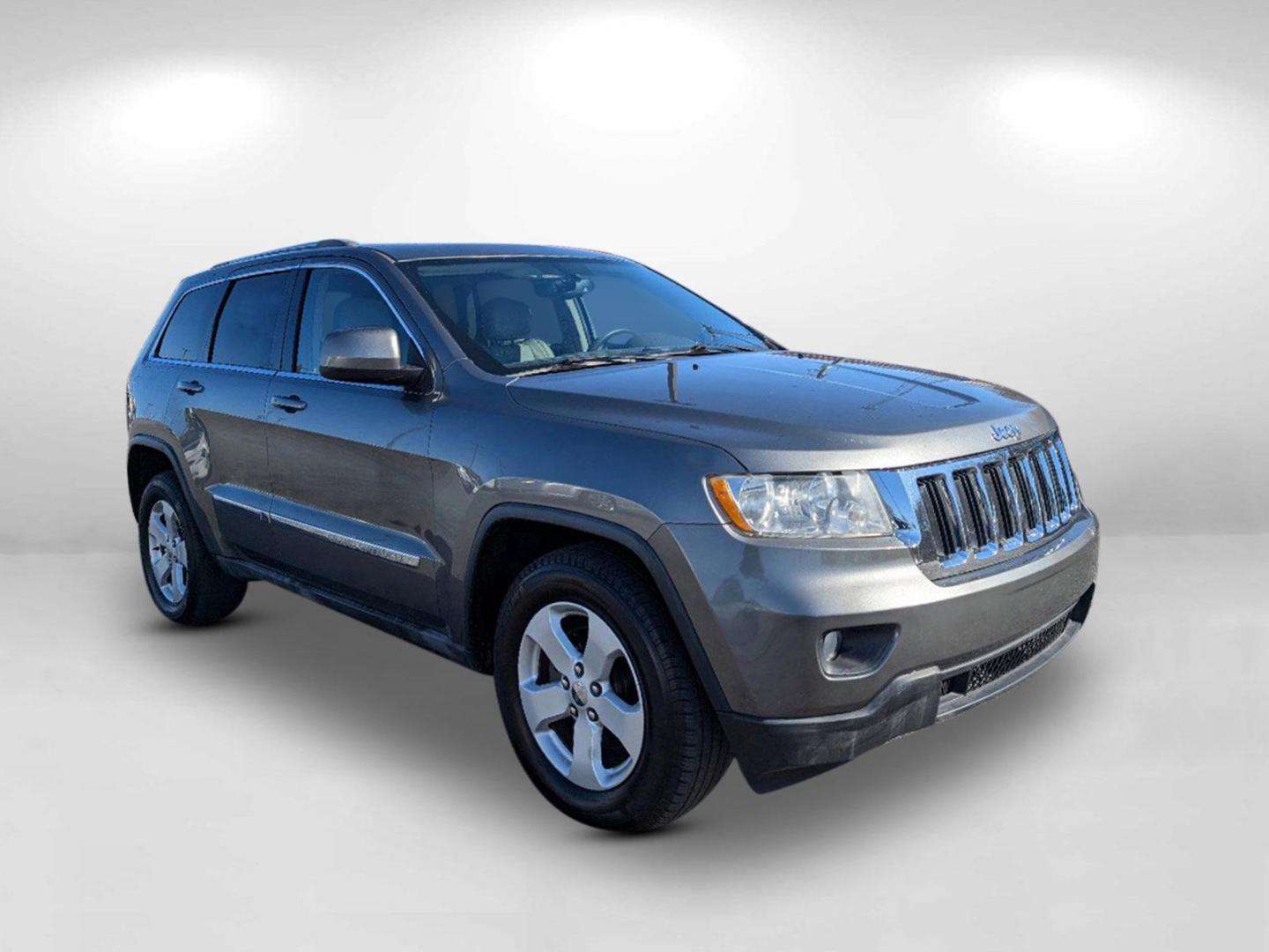 2011 /Dark Graystone/Medium Graystone Interior Jeep Grand Cherokee Laredo (1J4RS4GG8BC) with an Gas/Ethanol V6 3.6L/220 engine, 5-Speed Automatic transmission, located at 7000 Northlake Connector, Columbus, GA, 31904, (706) 987-8085, 32.524975, -84.978134 - 2011 Jeep Grand Cherokee Laredo - Photo#2