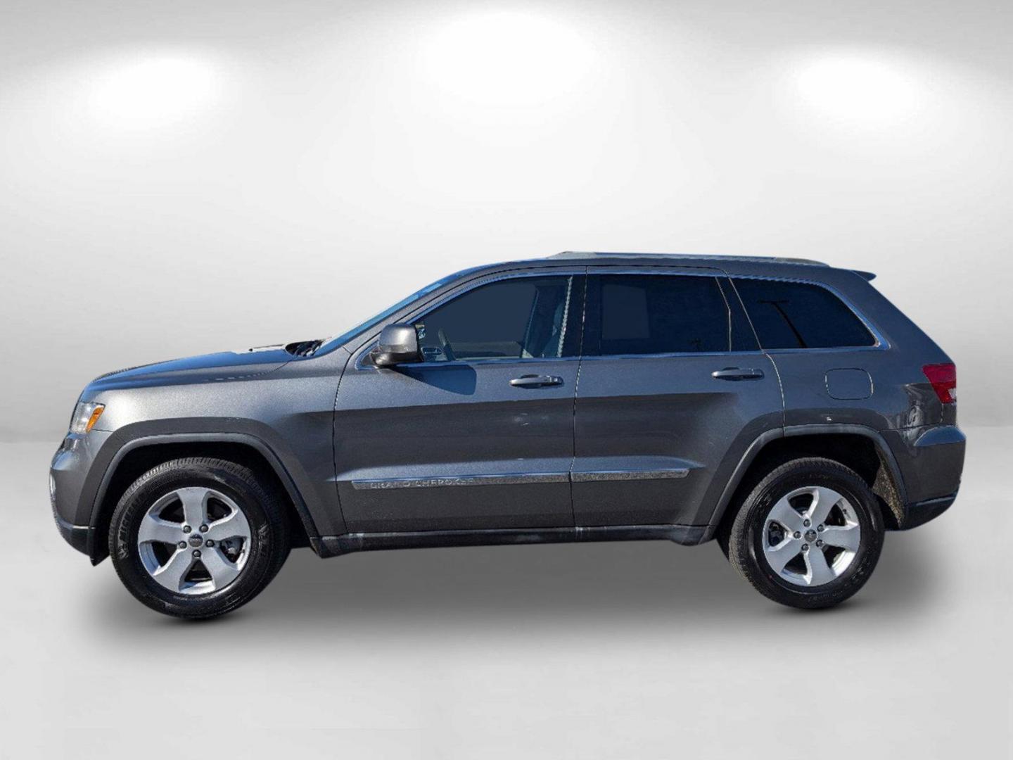 2011 /Dark Graystone/Medium Graystone Interior Jeep Grand Cherokee Laredo (1J4RS4GG8BC) with an Gas/Ethanol V6 3.6L/220 engine, 5-Speed Automatic transmission, located at 7000 Northlake Connector, Columbus, GA, 31904, (706) 987-8085, 32.524975, -84.978134 - 2011 Jeep Grand Cherokee Laredo - Photo#7