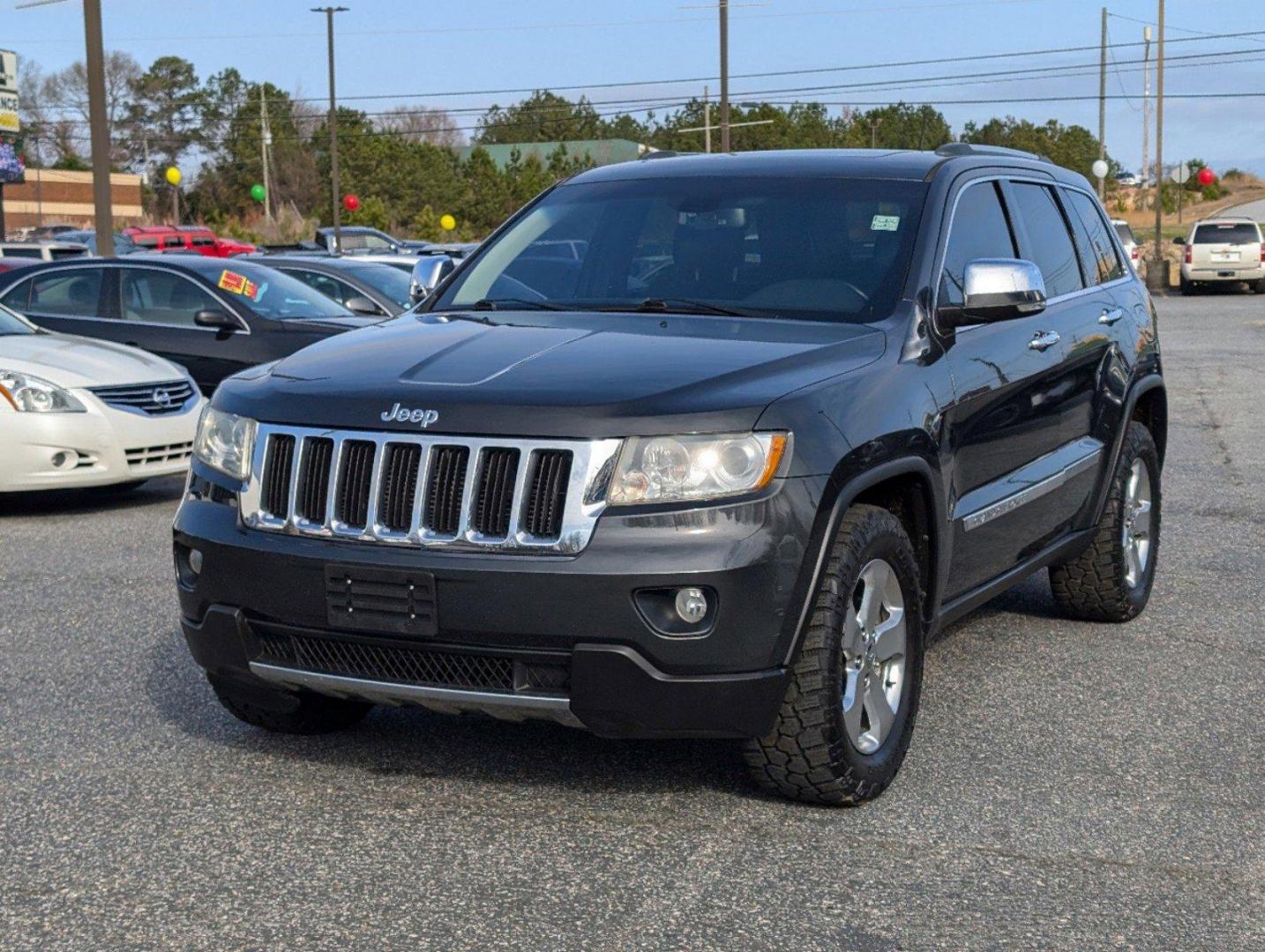 2011 /Black Interior Jeep Grand Cherokee Limited (1J4RS5GG5BC) with an Gas/Ethanol V6 3.6L/220 engine, 5-Speed Automatic transmission, located at 3959 U.S. 80 W, Phenix City, AL, 36870, (334) 297-4885, 32.469296, -85.135185 - 2011 Jeep Grand Cherokee Limited - Photo#0