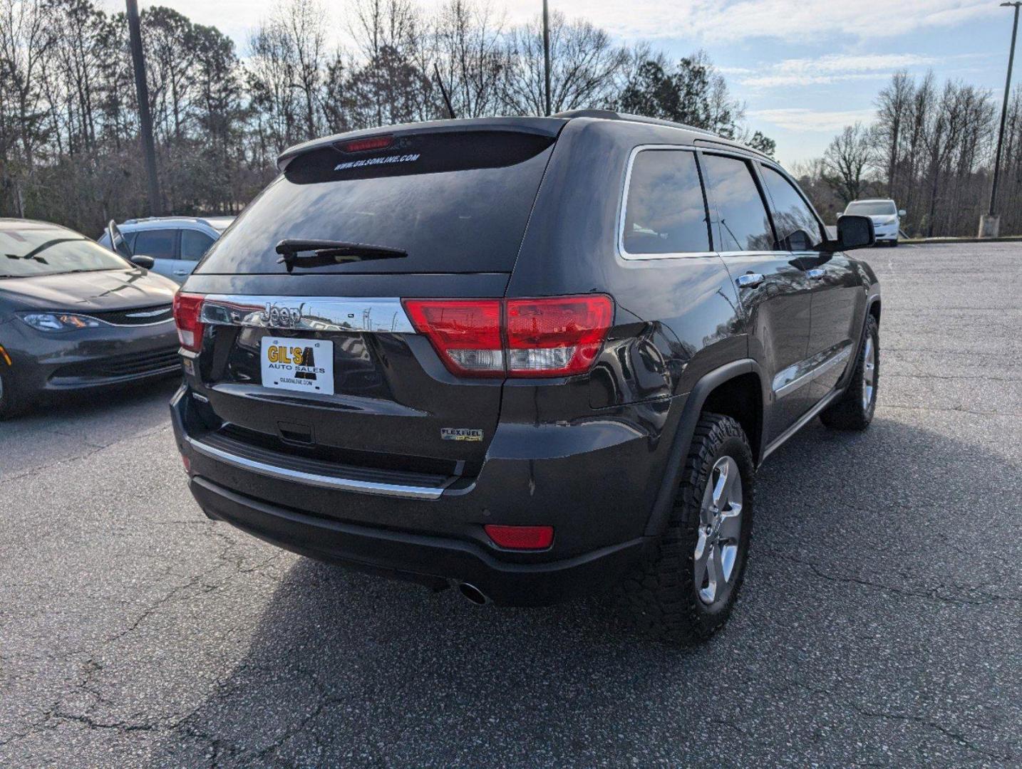 2011 /Black Interior Jeep Grand Cherokee Limited (1J4RS5GG5BC) with an Gas/Ethanol V6 3.6L/220 engine, 5-Speed Automatic transmission, located at 3959 U.S. 80 W, Phenix City, AL, 36870, (334) 297-4885, 32.469296, -85.135185 - 2011 Jeep Grand Cherokee Limited - Photo#4