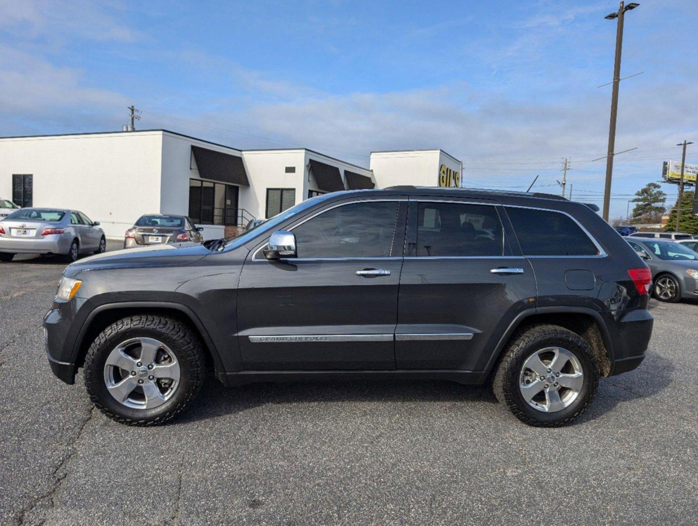 2011 /Black Interior Jeep Grand Cherokee Limited (1J4RS5GG5BC) with an Gas/Ethanol V6 3.6L/220 engine, 5-Speed Automatic transmission, located at 3959 U.S. 80 W, Phenix City, AL, 36870, (334) 297-4885, 32.469296, -85.135185 - 2011 Jeep Grand Cherokee Limited - Photo#7