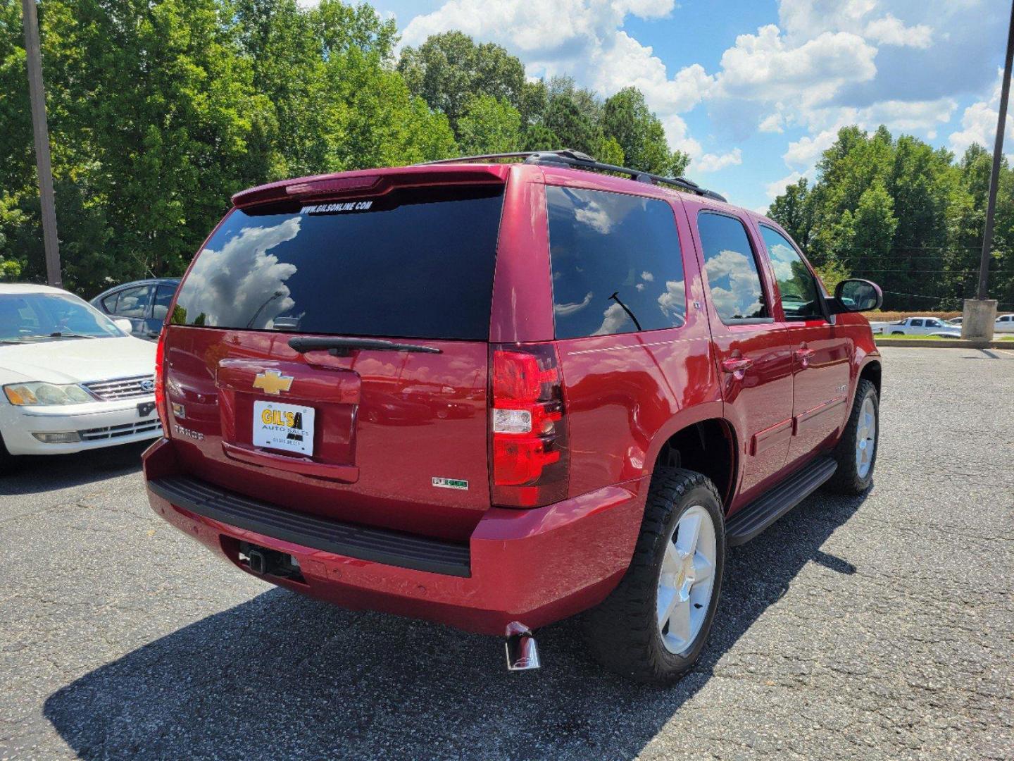 2012 Crystal Red Tintcoat /Light Cashmere/Dark Cashmere Chevrolet Tahoe LT (1GNSKBE05CR) with an Gas/Ethanol V8 5.3L/323 engine, 6-Speed Automatic w/OD transmission, located at 5115 14th Ave., Columbus, GA, 31904, (706) 323-0345, 32.511494, -84.971046 - 2012 Chevrolet Tahoe LT - Photo#5