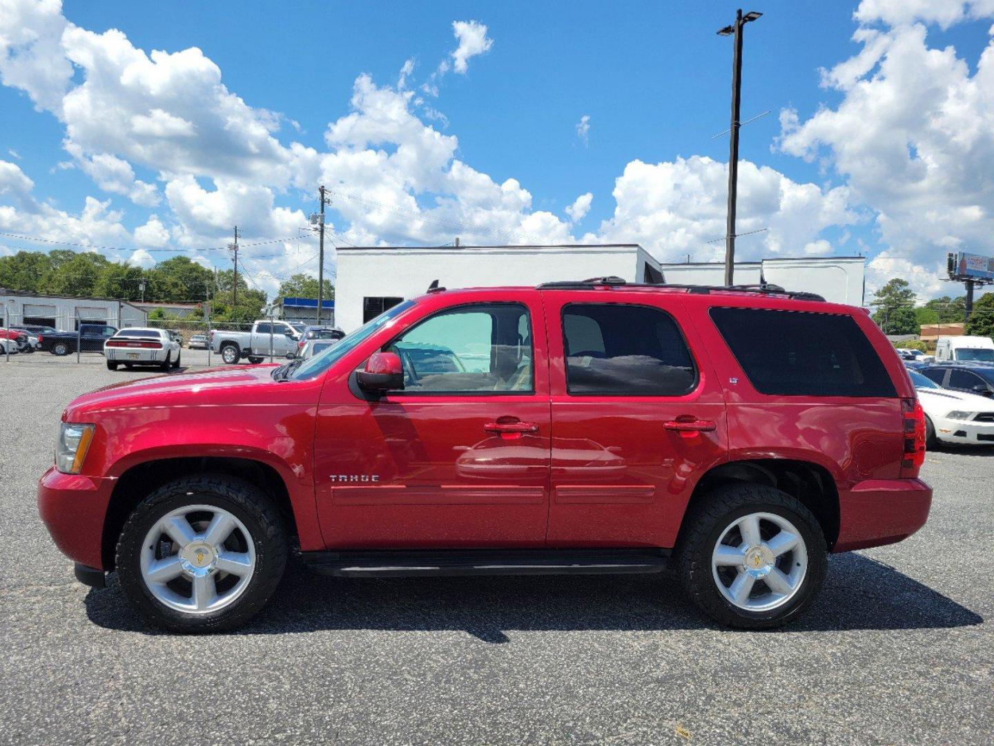 2012 Crystal Red Tintcoat /Light Cashmere/Dark Cashmere Chevrolet Tahoe LT (1GNSKBE05CR) with an Gas/Ethanol V8 5.3L/323 engine, 6-Speed Automatic w/OD transmission, located at 5115 14th Ave., Columbus, GA, 31904, (706) 323-0345, 32.511494, -84.971046 - 2012 Chevrolet Tahoe LT - Photo#8