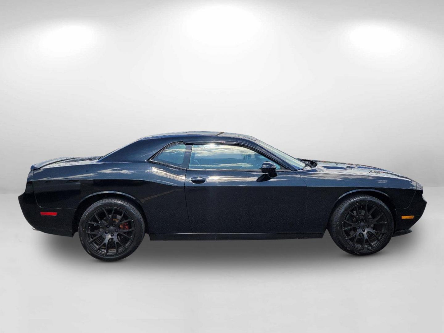 2012 Black /Dark Slate Gray Interior Dodge Challenger SXT Plus (2C3CDYAG1CH) with an Gas V6 3.6L/220 engine, 5-Speed Automatic transmission, located at 1430 Gateway Drive, Opelika, AL, 36801, (334) 239-0944, 32.637871, -85.409790 - 2012 Dodge Challenger SXT Plus - Photo#3