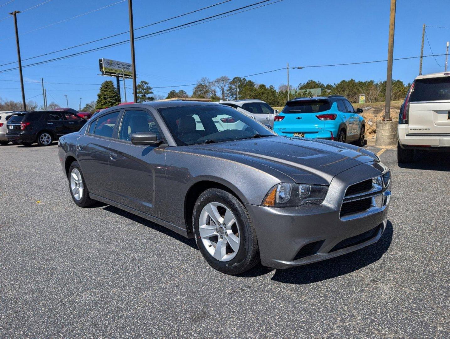 2012 /Black/Light Frost Beige Interior Dodge Charger SE (2C3CDXBG0CH) with an Gas V6 3.6L/220 engine, 5-Speed Automatic transmission, located at 3959 U.S. 80 W, Phenix City, AL, 36870, (334) 297-4885, 32.469296, -85.135185 - 2012 Dodge Charger SE - Photo#2