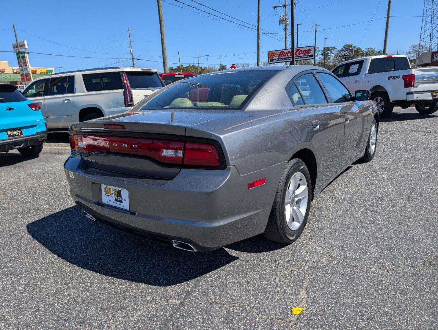 2012 /Black/Light Frost Beige Interior Dodge Charger SE (2C3CDXBG0CH) with an Gas V6 3.6L/220 engine, 5-Speed Automatic transmission, located at 3959 U.S. 80 W, Phenix City, AL, 36870, (334) 297-4885, 32.469296, -85.135185 - 2012 Dodge Charger SE - Photo#4