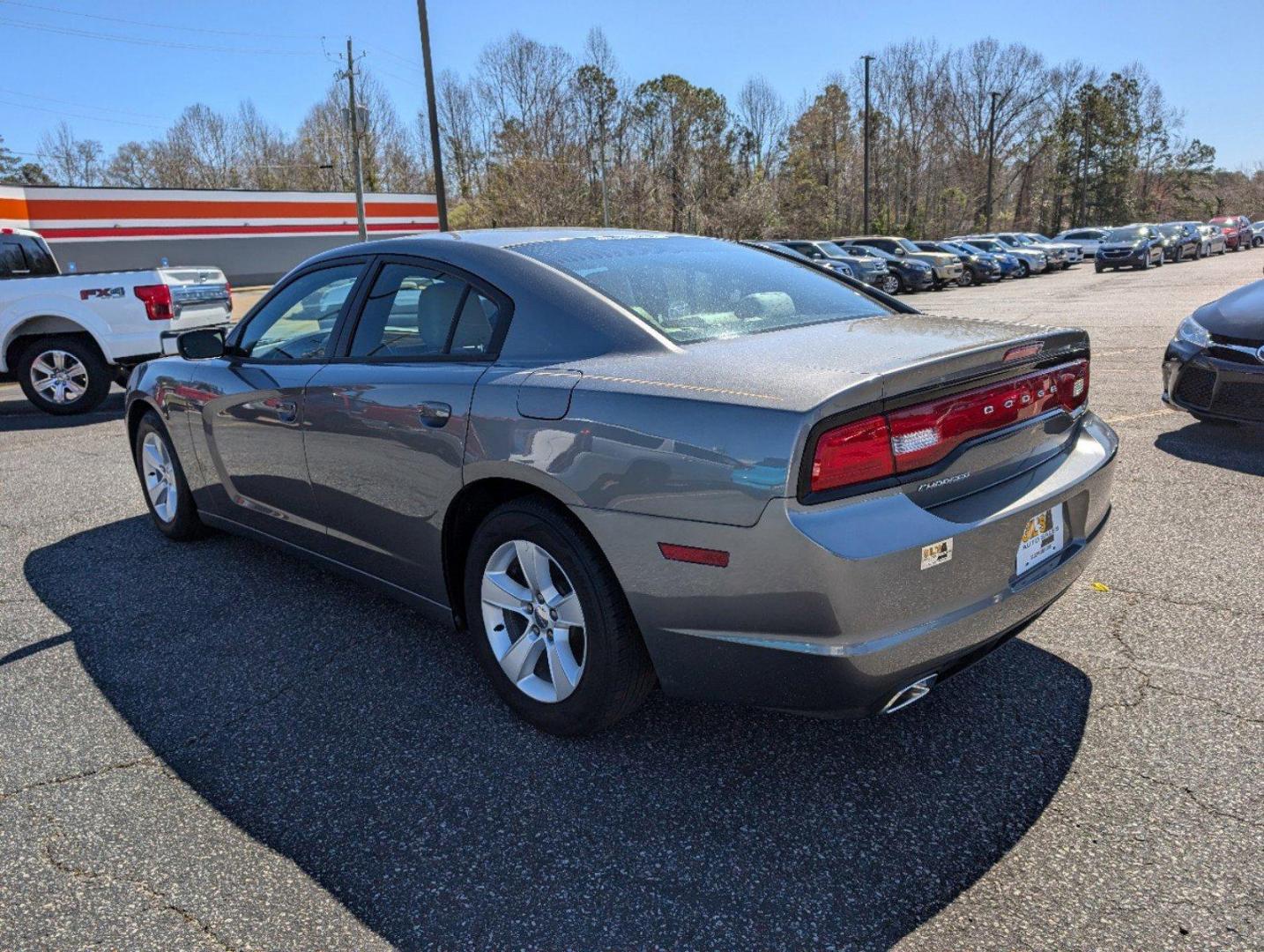 2012 /Black/Light Frost Beige Interior Dodge Charger SE (2C3CDXBG0CH) with an Gas V6 3.6L/220 engine, 5-Speed Automatic transmission, located at 3959 U.S. 80 W, Phenix City, AL, 36870, (334) 297-4885, 32.469296, -85.135185 - 2012 Dodge Charger SE - Photo#6