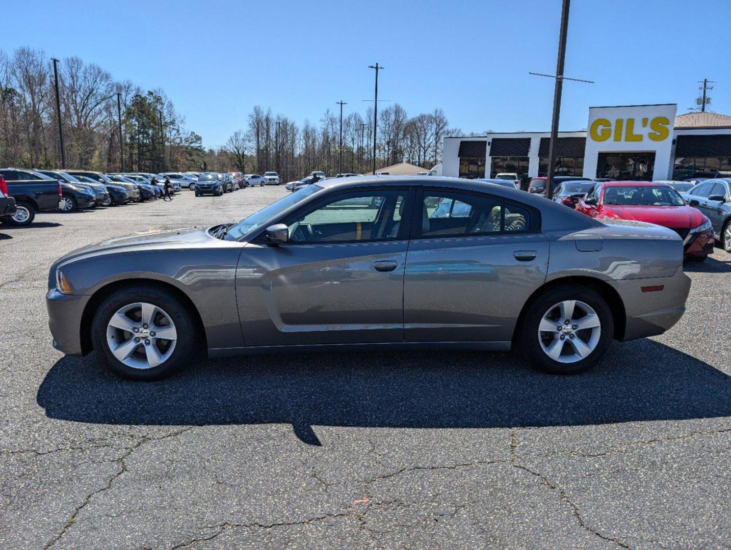 2012 /Black/Light Frost Beige Interior Dodge Charger SE (2C3CDXBG0CH) with an Gas V6 3.6L/220 engine, 5-Speed Automatic transmission, located at 3959 U.S. 80 W, Phenix City, AL, 36870, (334) 297-4885, 32.469296, -85.135185 - 2012 Dodge Charger SE - Photo#7