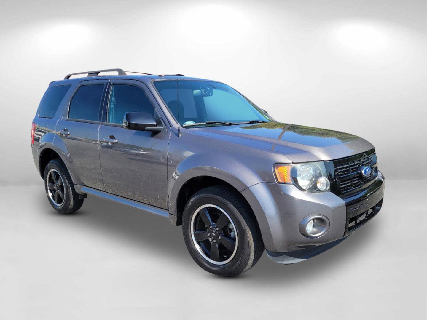 2012 Gray Ford Escape XLT (1FMCU0DGXCK) with an Gas/Ethanol V6 3.0L/181 engine, 6-Speed Automatic transmission, located at 1430 Gateway Drive, Opelika, AL, 36801, (334) 239-0944, 32.637871, -85.409790 - 2012 Ford Escape XLT - Photo#2