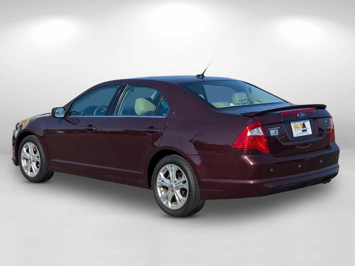 2012 Maroon Ford Fusion SE (3FAHP0HA0CR) with an Gas I4 2.5L/152 engine, 6-Speed Automatic transmission, located at 804 22nd Ave, Phenix City, AL, 36870, (334) 297-1860, 32.484749, -85.024475 - 2012 Ford Fusion SE - Photo#3