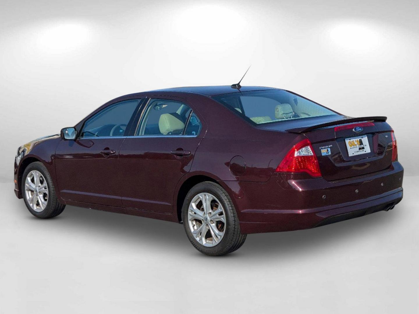 2012 Maroon Ford Fusion SE (3FAHP0HA0CR) with an Gas I4 2.5L/152 engine, 6-Speed Automatic transmission, located at 804 22nd Ave, Phenix City, AL, 36870, (334) 297-1860, 32.484749, -85.024475 - 2012 Ford Fusion SE - Photo#4