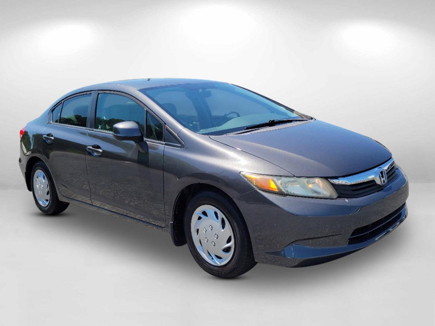 2012 Gray Honda Civic Sdn LX (19XFB2F52CE) with an Gas I4 1.8L/110 engine, 5-Speed Automatic transmission, located at 7000 Northlake Connector, Columbus, GA, 31904, (706) 987-8085, 32.524975, -84.978134 - 2012 Honda Civic Sdn LX - Photo#2