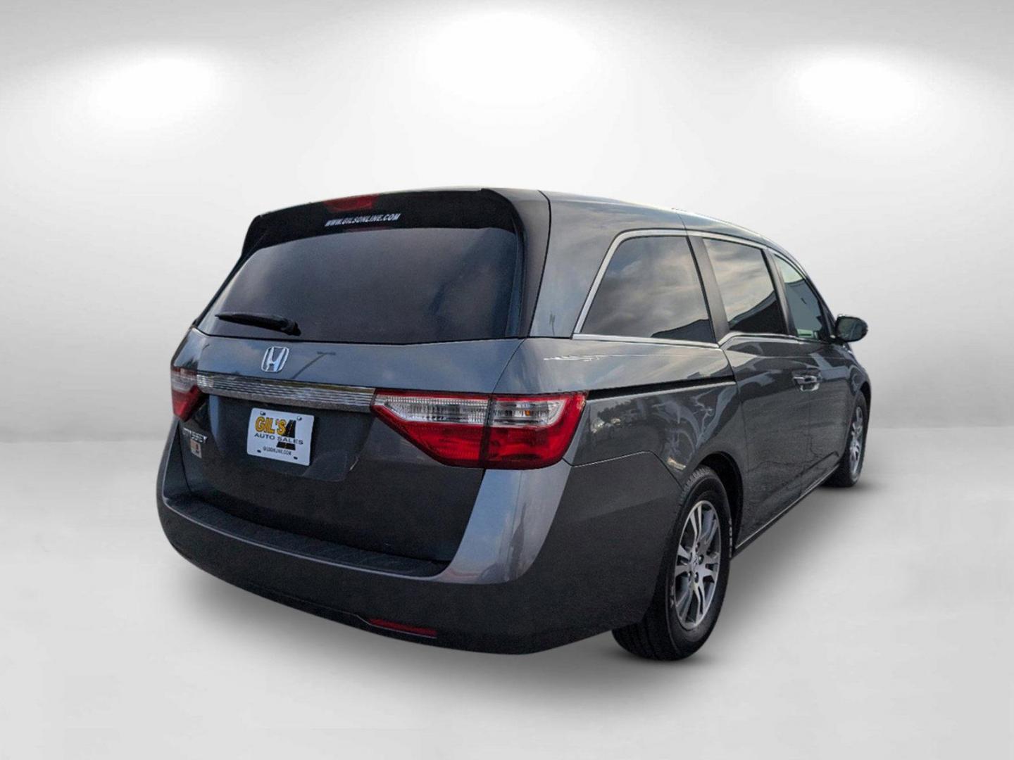 2012 Honda Odyssey EX-L (5FNRL5H60CB) with an Gas V6 3.5L/212 engine, 5-Speed Automatic transmission, located at 3959 U.S. 80 W, Phenix City, AL, 36870, (334) 297-4885, 32.469296, -85.135185 - 2012 Honda Odyssey EX-L - Photo#4