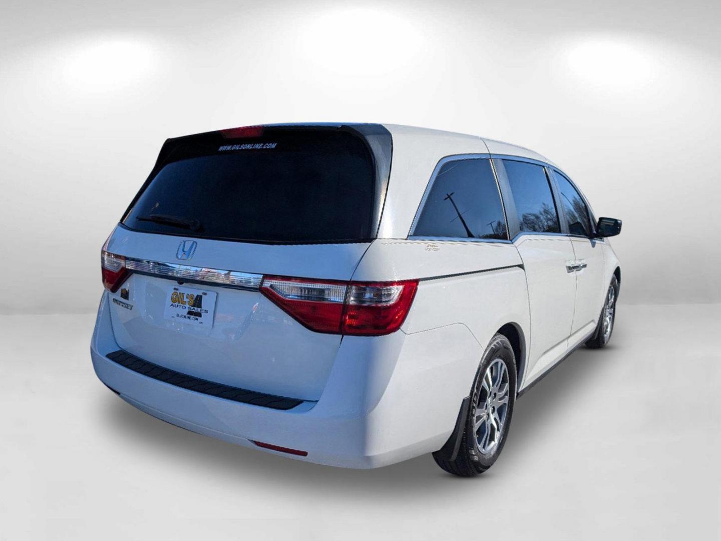 2012 Honda Odyssey EX-L (5FNRL5H62CB) with an Gas V6 3.5L/212 engine, 5-Speed Automatic transmission, located at 804 22nd Ave, Phenix City, AL, 36870, (334) 297-1860, 32.484749, -85.024475 - 2012 Honda Odyssey EX-L - Photo#4