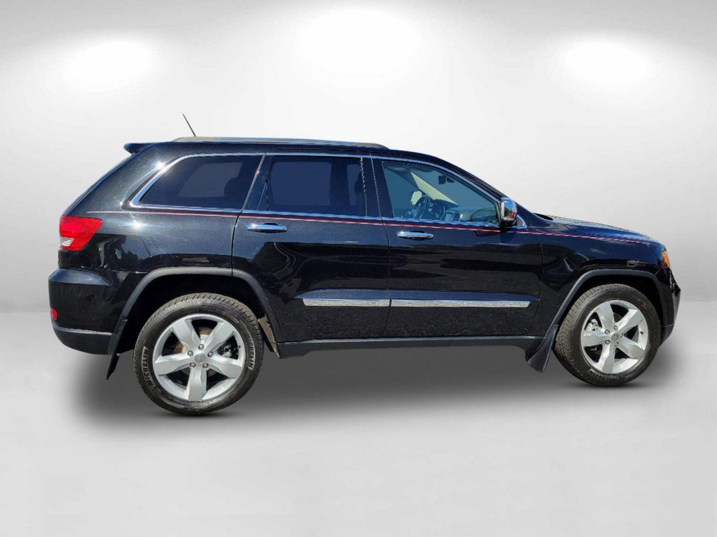 2012 Brilliant Black Crystal Pearl /Black Jeep Grand Cherokee Limited (1C4RJFBGXCC) with an Gas/Ethanol V6 3.6L/220 engine, 5-Speed Automatic transmission, located at 1430 Gateway Drive, Opelika, AL, 36801, (334) 239-0944, 32.637871, -85.409790 - 2012 Jeep Grand Cherokee Limited - Photo#3