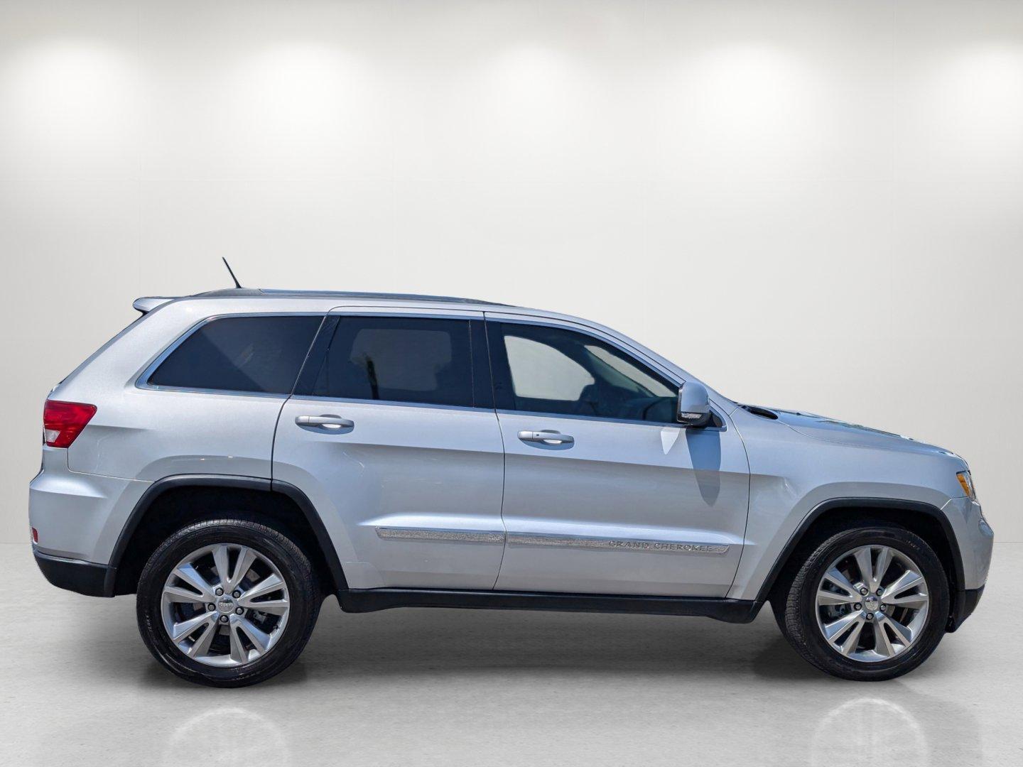 2012 /Black Jeep Grand Cherokee Laredo (1C4RJFAG0CC) with an Gas/Ethanol V6 3.6L/220 engine, 5-Speed Automatic transmission, located at 3959 U.S. 80 W, Phenix City, AL, 36870, (334) 297-4885, 32.469296, -85.135185 - 2012 Jeep Grand Cherokee Laredo - Photo#4