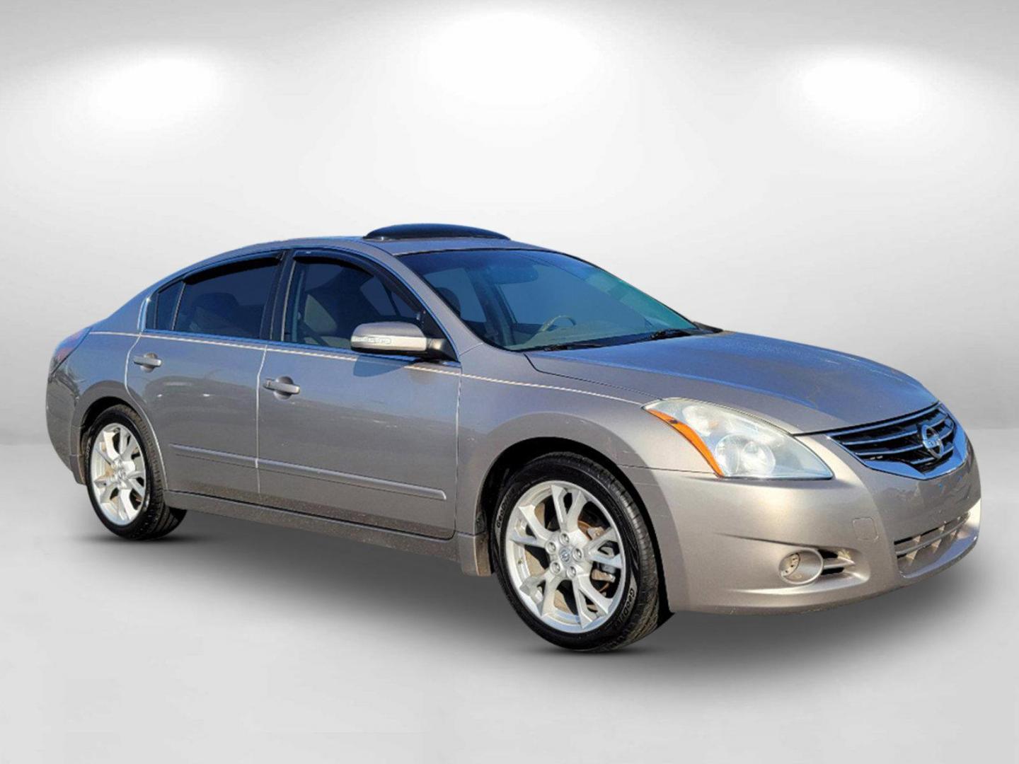 2012 Saharan Stone Metallic /Blonde Nissan Altima 2.5 SL (1N4AL2AP5CC) with an Gas I4 2.5L/ engine, 1-Speed Continuously Variable Ratio transmission, located at 7000 Northlake Connector, Columbus, GA, 31904, (706) 987-8085, 32.524975, -84.978134 - 2012 Nissan Altima 2.5 SL - Photo#2